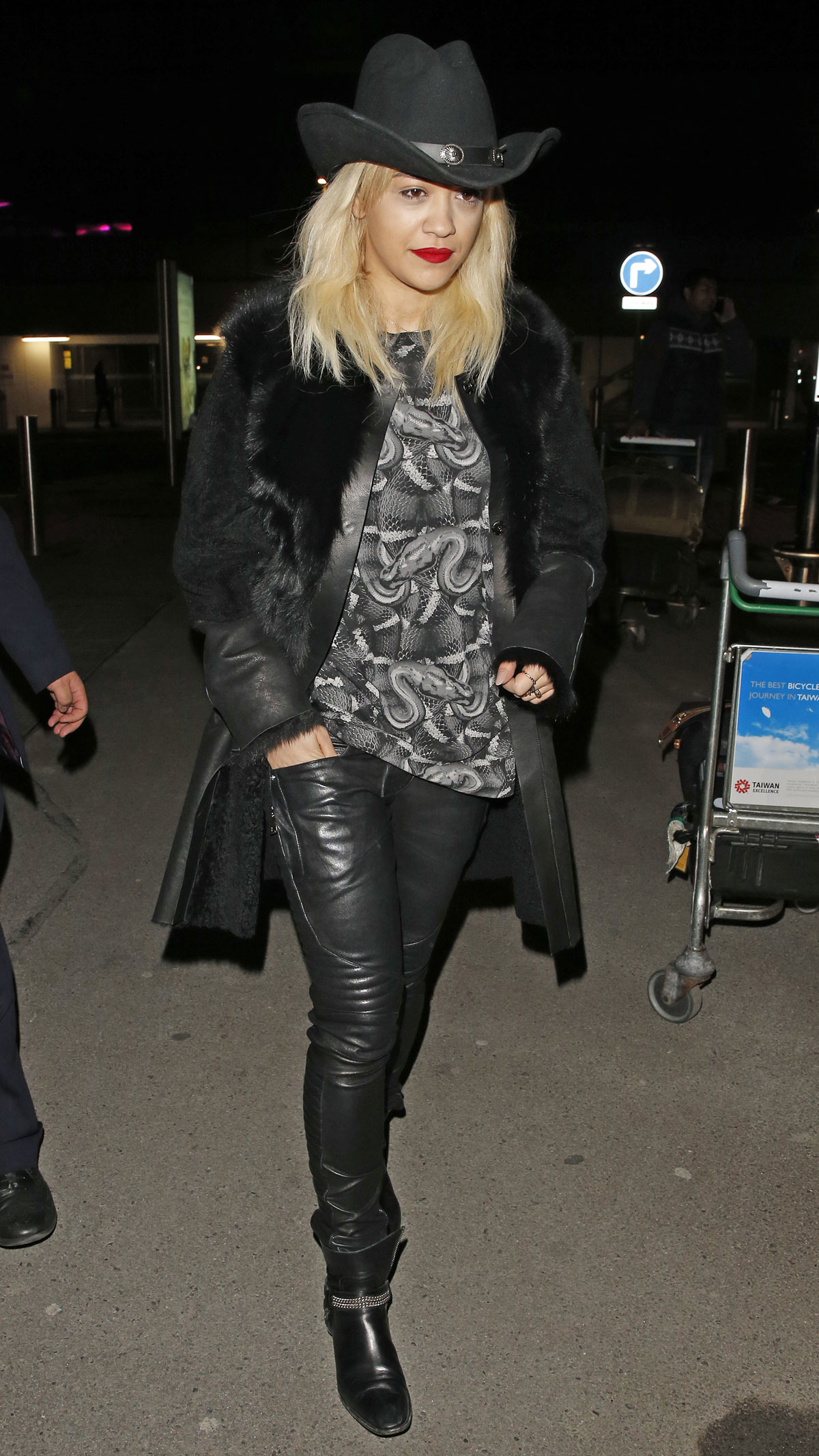 Rita Ora arrives at London Heathrow Airport