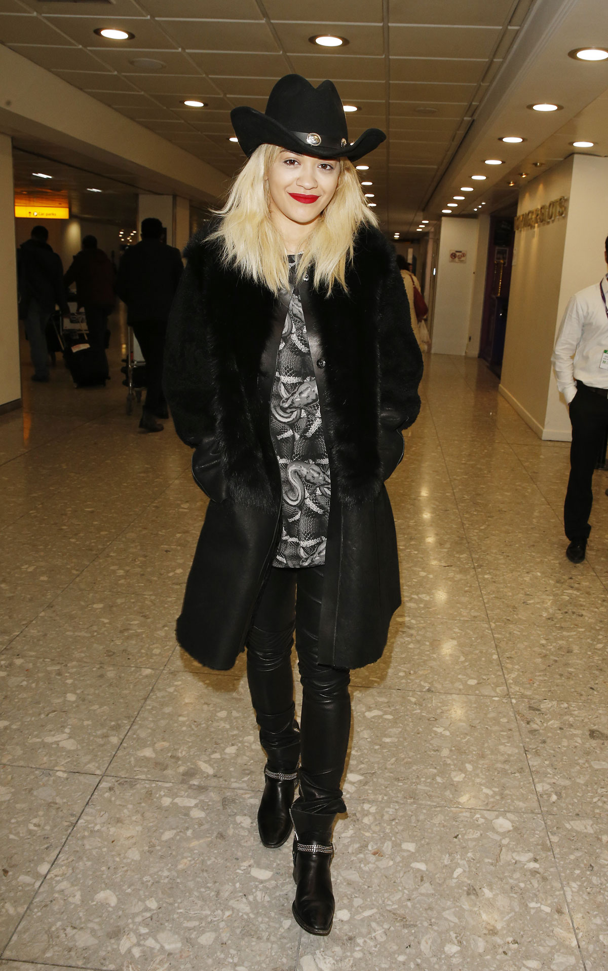 Rita Ora arrives at London Heathrow Airport