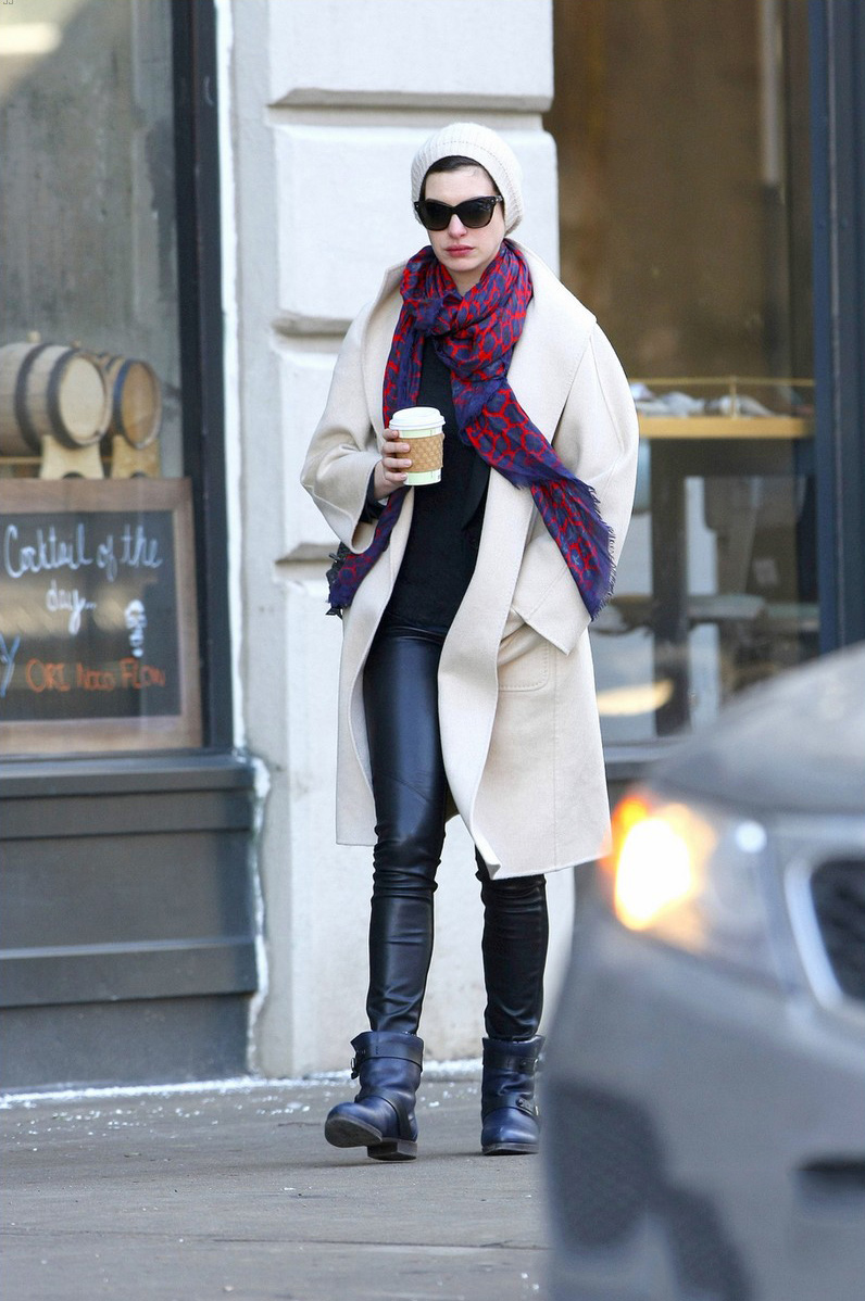 Anne Hathaway picks up a coffee in the SoHo neighborhood