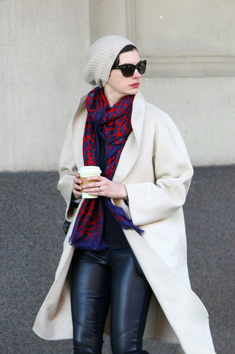 Anne Hathaway picks up a coffee in the SoHo neighborhood