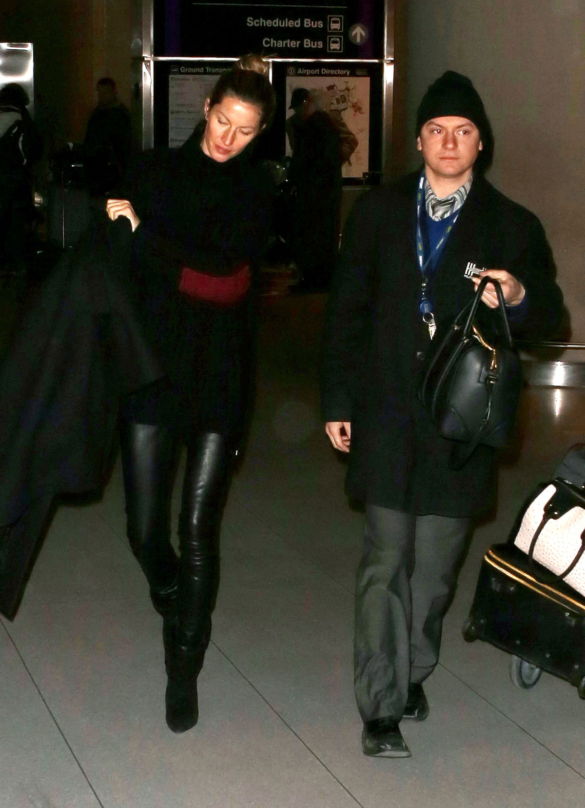 Gisele Bundchen is seen as she arrives at Logan International Airport