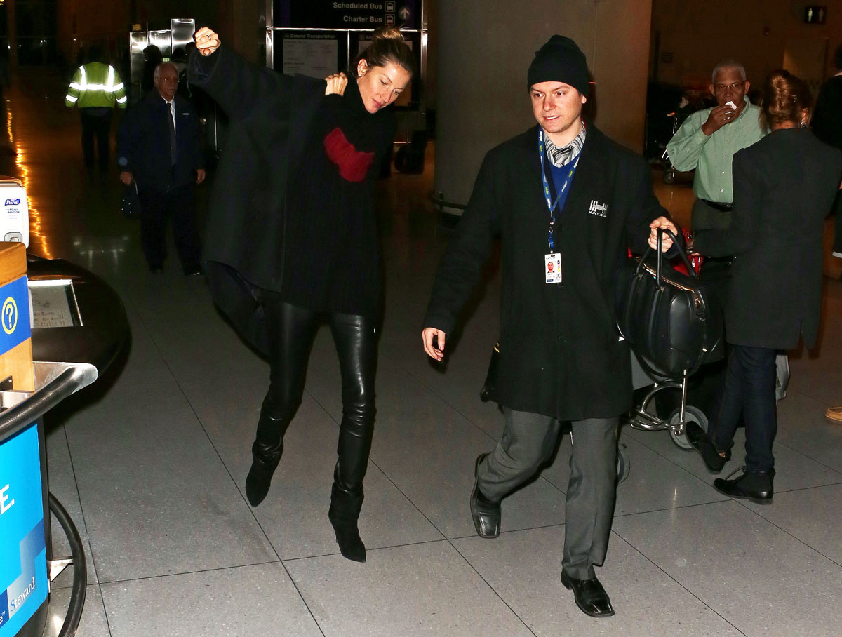Gisele Bundchen is seen as she arrives at Logan International Airport
