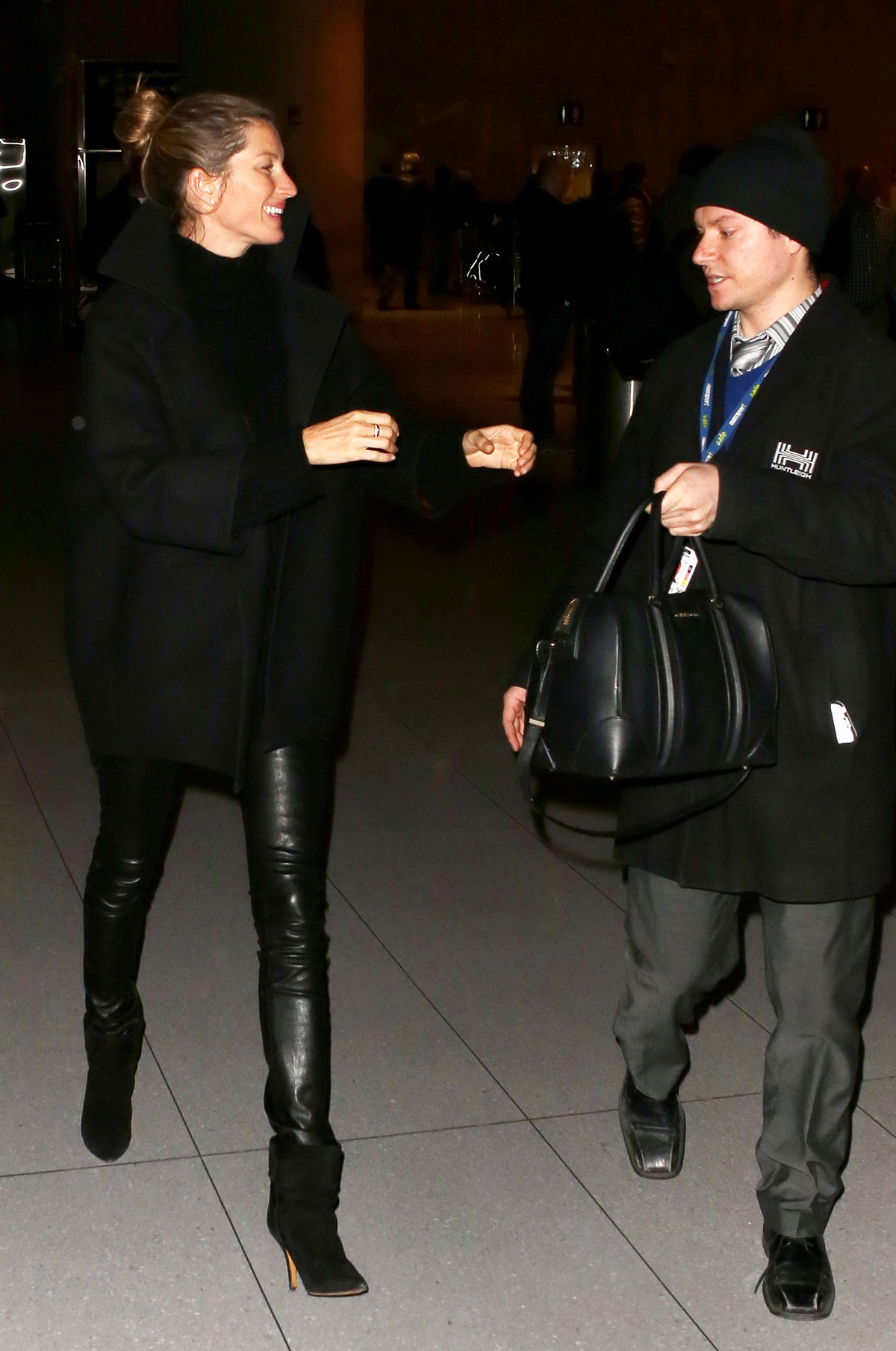 Gisele Bundchen is seen as she arrives at Logan International Airport