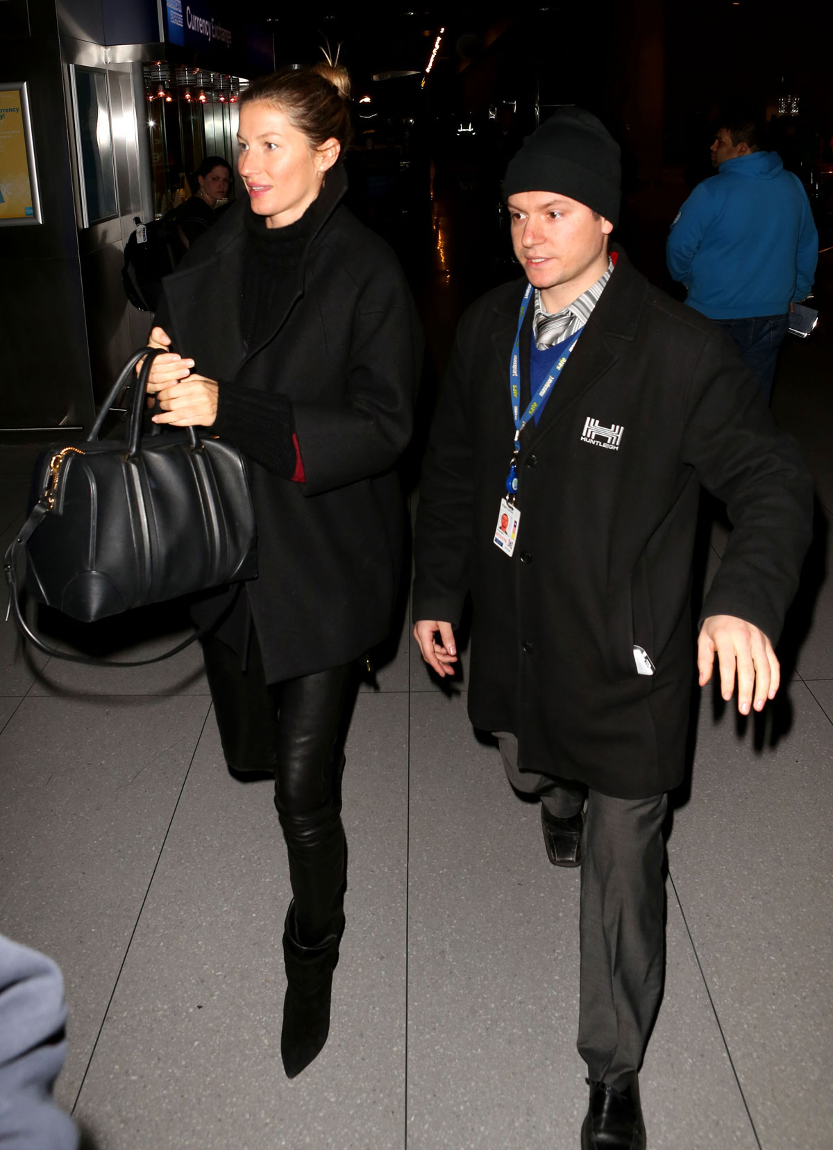 Gisele Bundchen is seen as she arrives at Logan International Airport