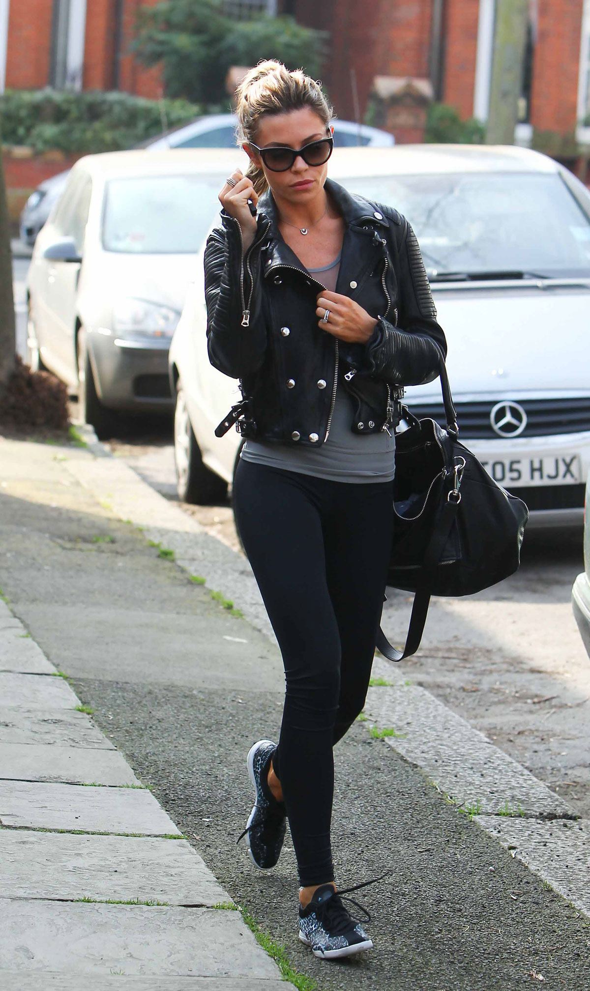 Abbey Clancy leaves her central London home to go to the gym