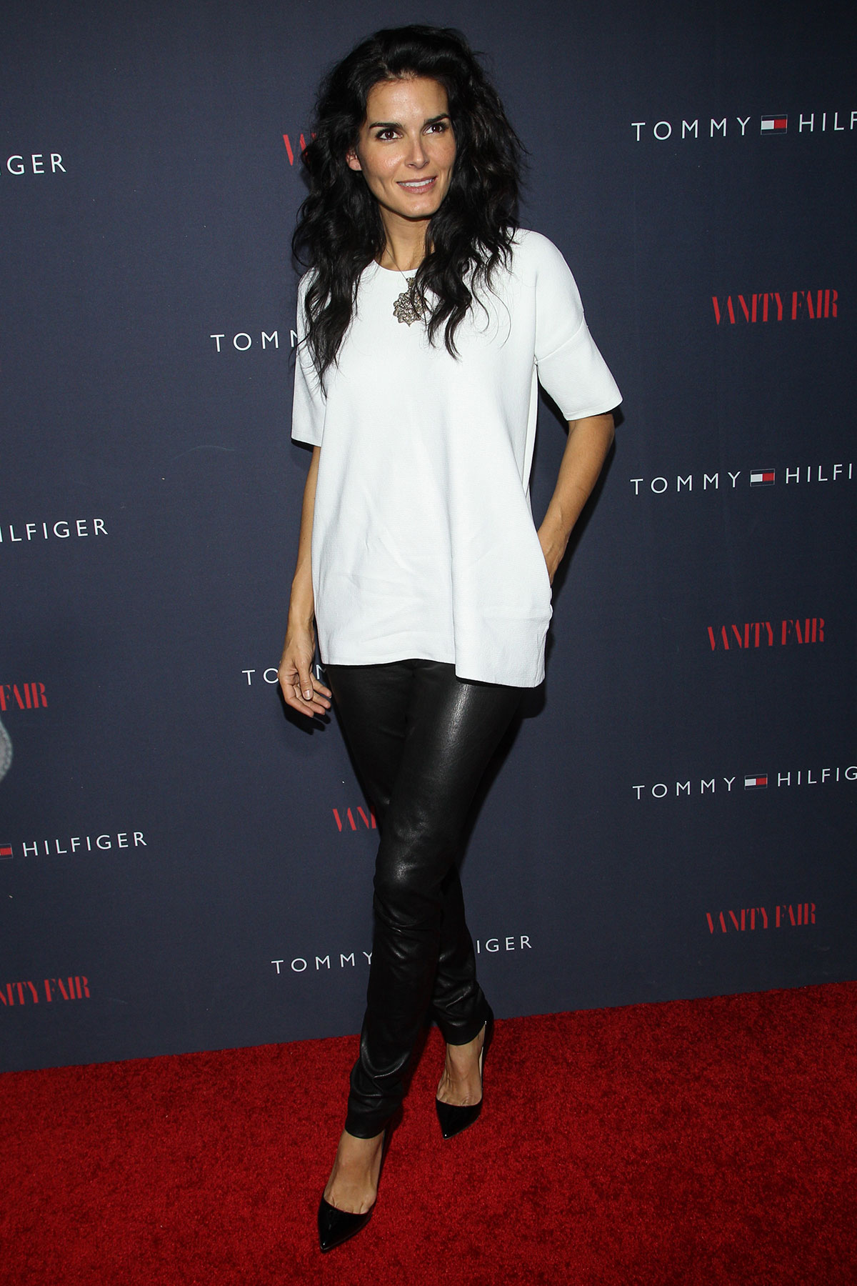 Angie Harmon attends Zooey Deschanel And Tommy Hilfiger Debut New Capsule Collection
