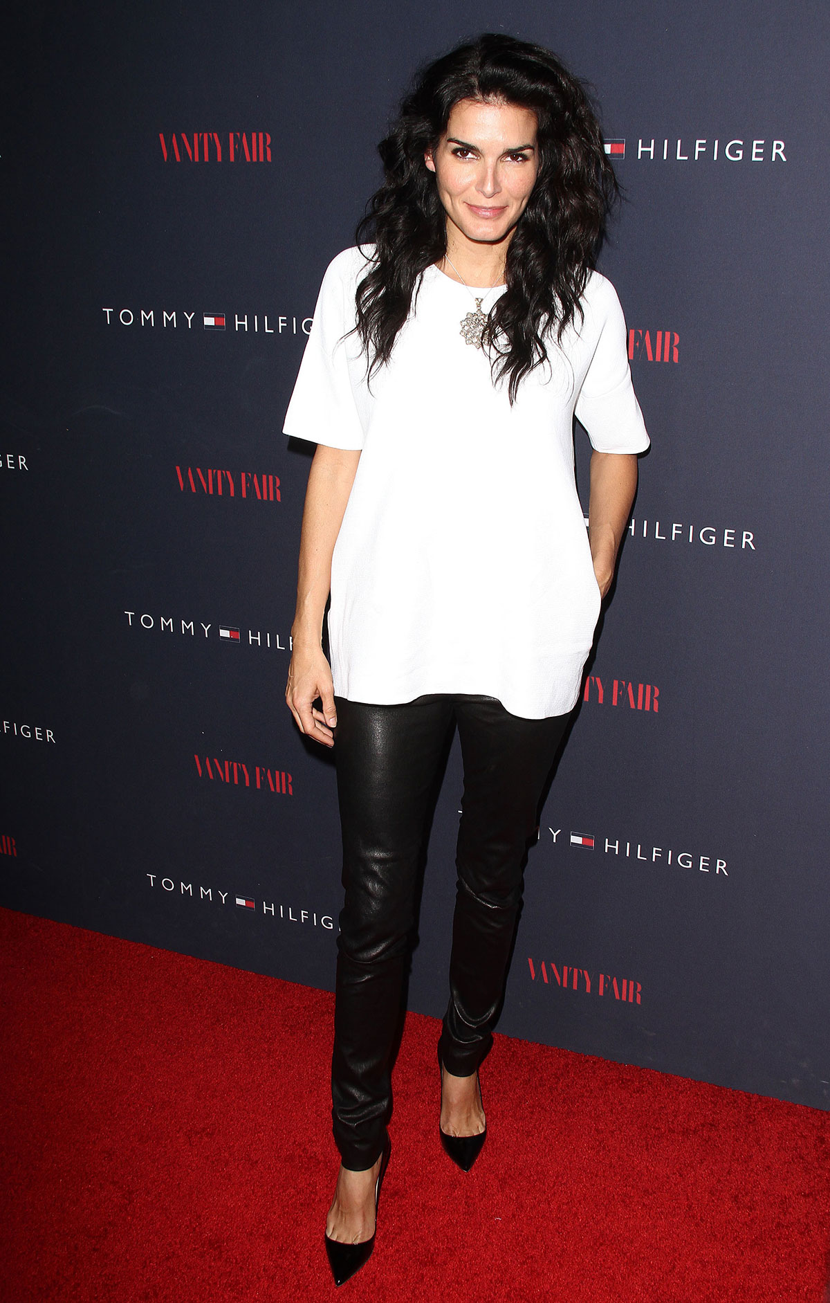 Angie Harmon attends Zooey Deschanel And Tommy Hilfiger Debut New Capsule Collection