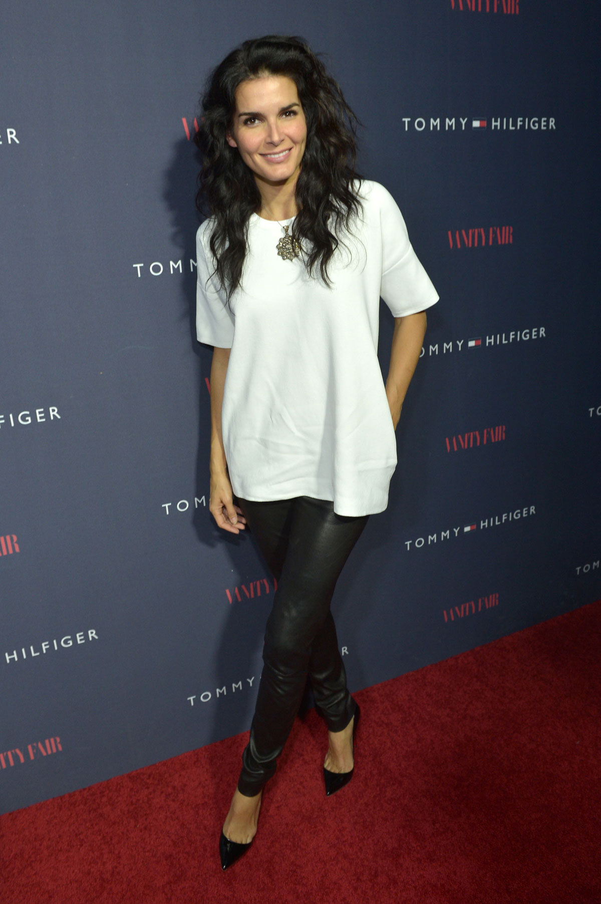 Angie Harmon attends Zooey Deschanel And Tommy Hilfiger Debut New Capsule Collection