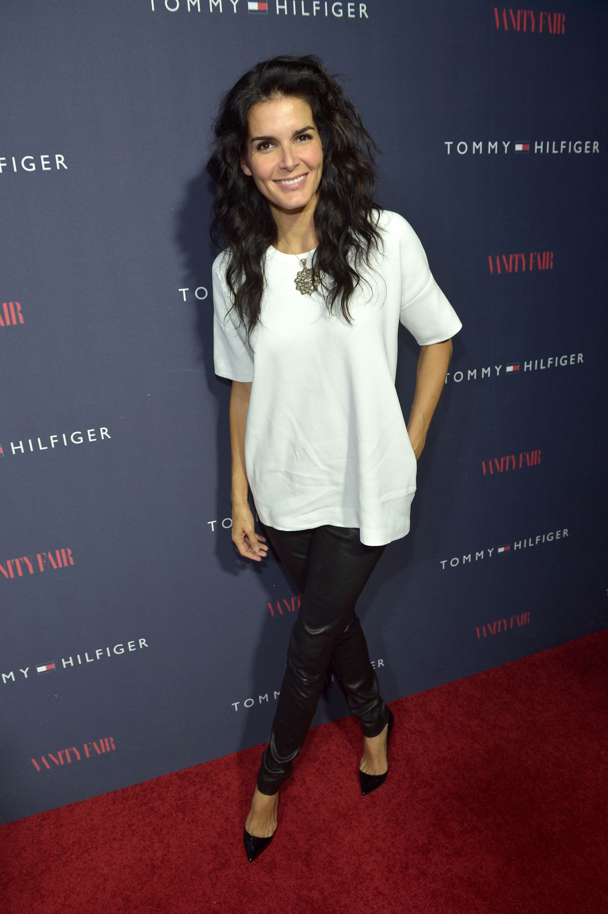 Angie Harmon attends Zooey Deschanel And Tommy Hilfiger Debut New Capsule Collection