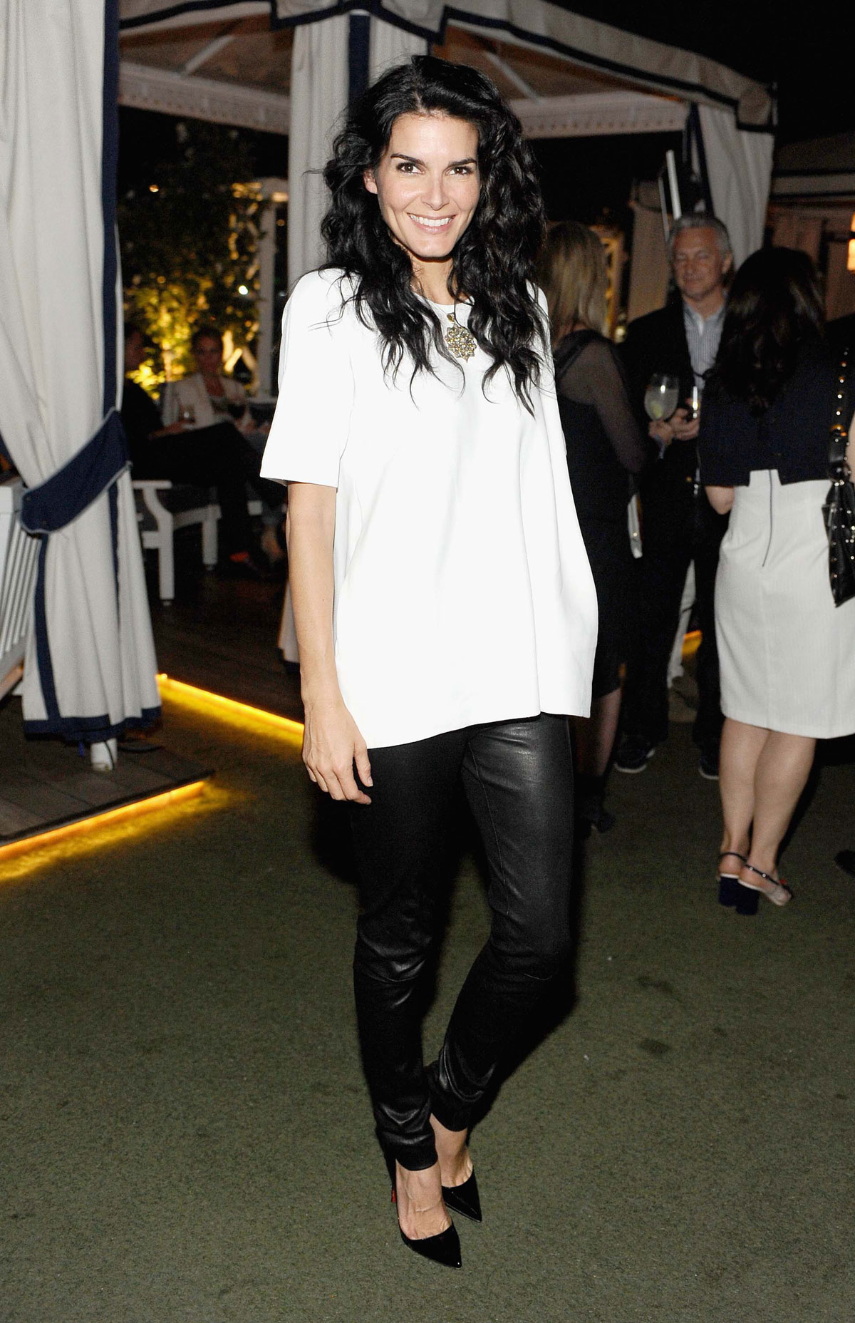 Angie Harmon attends Zooey Deschanel And Tommy Hilfiger Debut New Capsule Collection