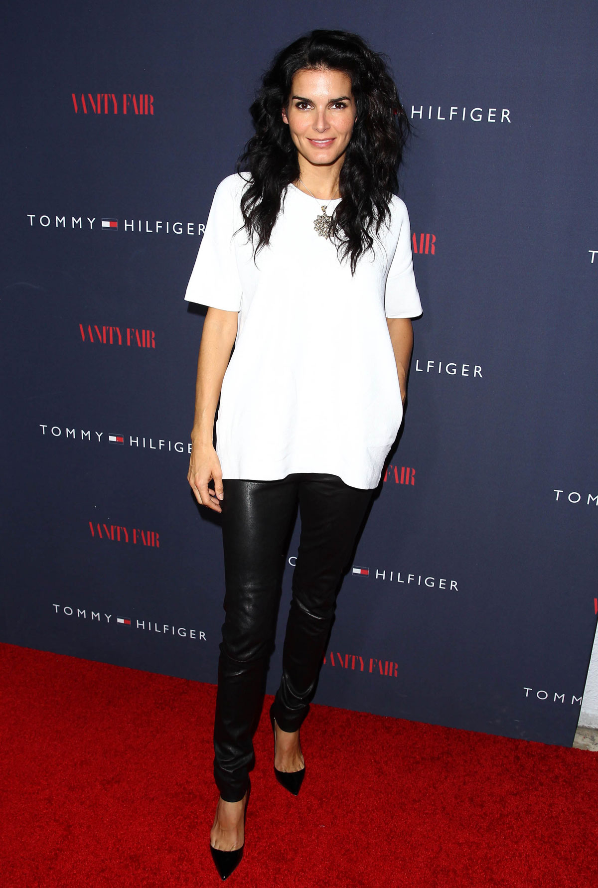 Angie Harmon attends Zooey Deschanel And Tommy Hilfiger Debut New Capsule Collection