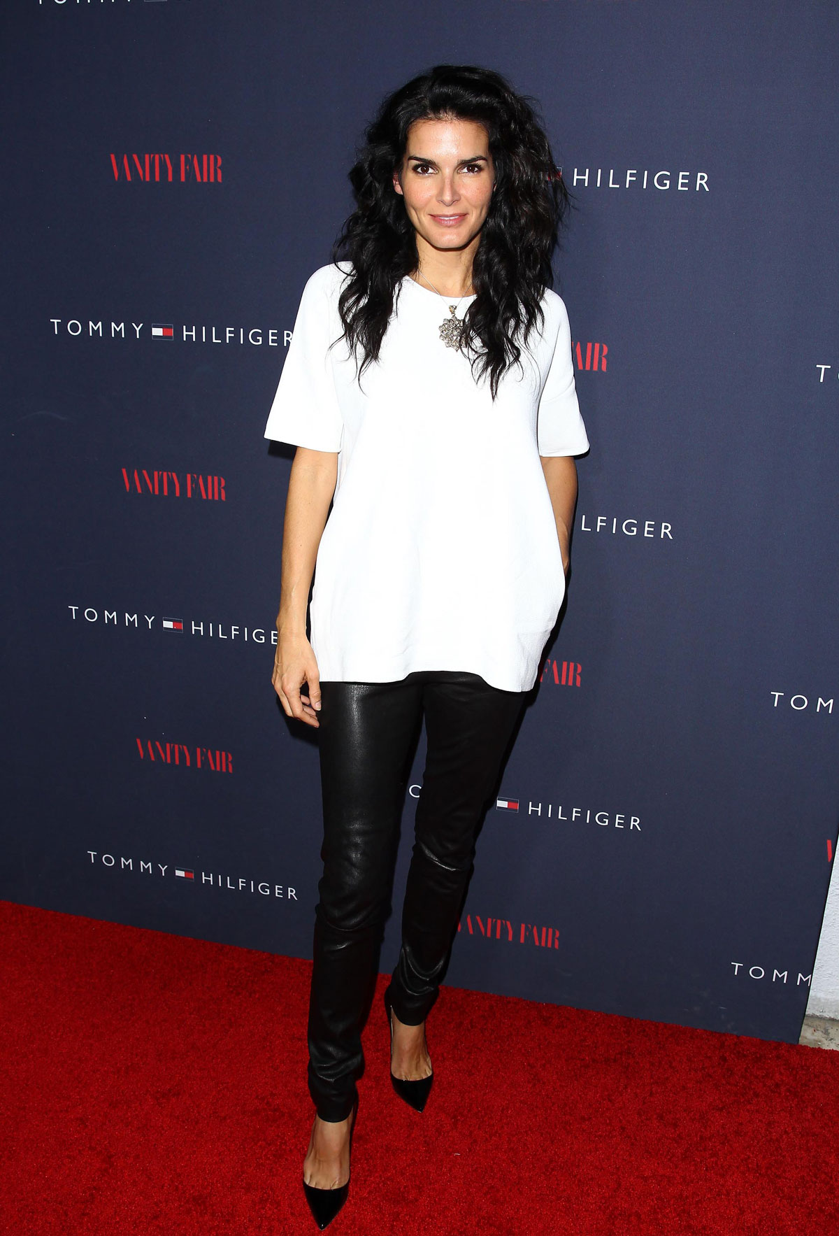 Angie Harmon attends Zooey Deschanel And Tommy Hilfiger Debut New Capsule Collection