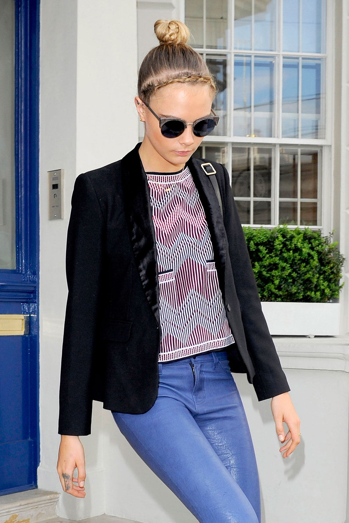 Cara Delevingne seen leaving home and heads to a London hotel