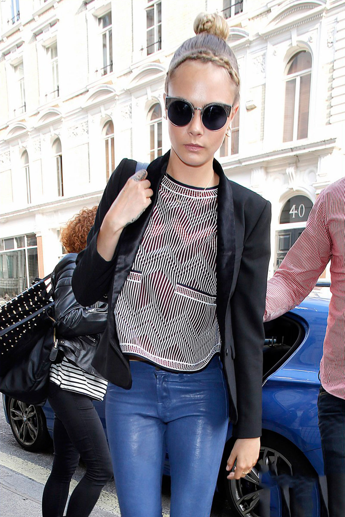 Cara Delevingne seen leaving home and heads to a London hotel