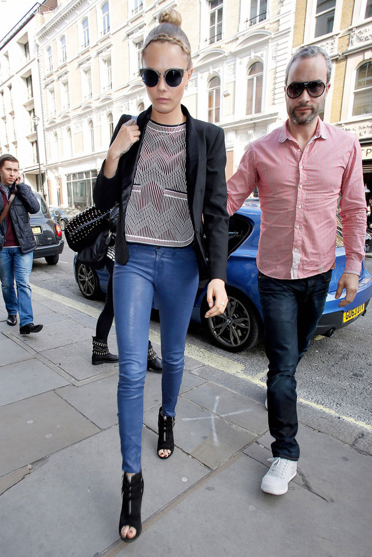 Cara Delevingne seen leaving home and heads to a London hotel