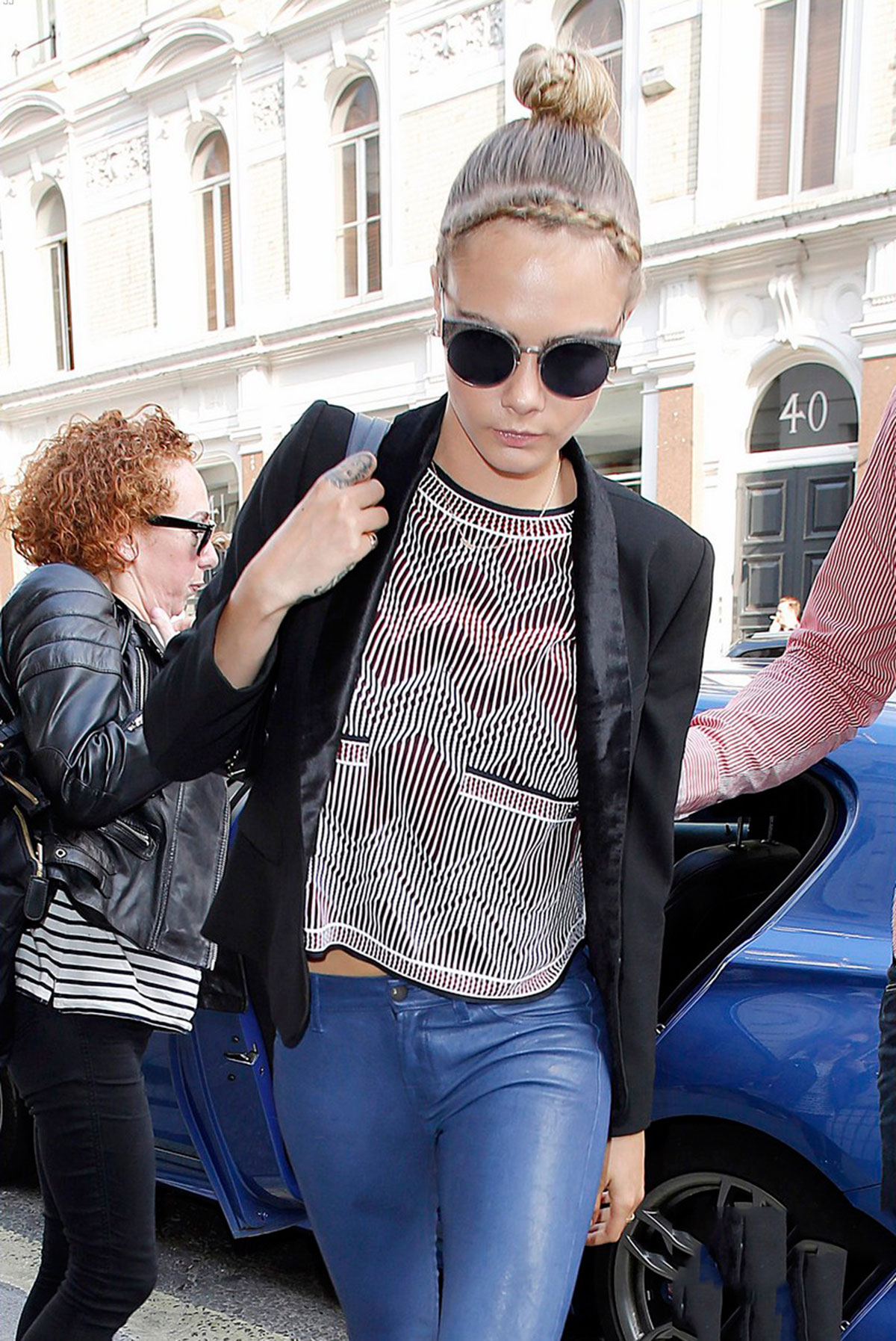 Cara Delevingne seen leaving home and heads to a London hotel