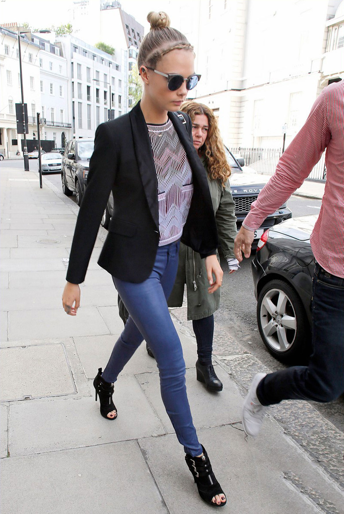 Cara Delevingne seen leaving home and heads to a London hotel