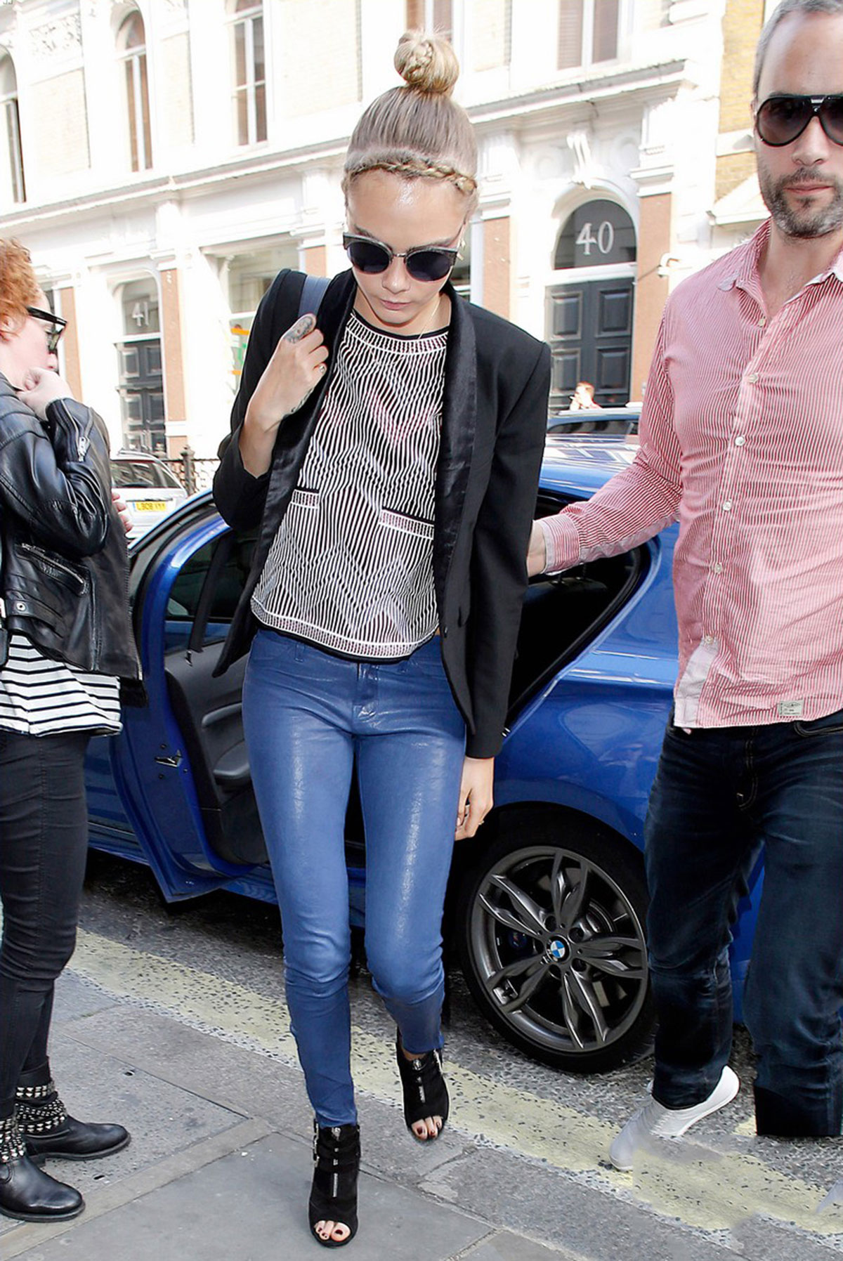 Cara Delevingne seen leaving home and heads to a London hotel