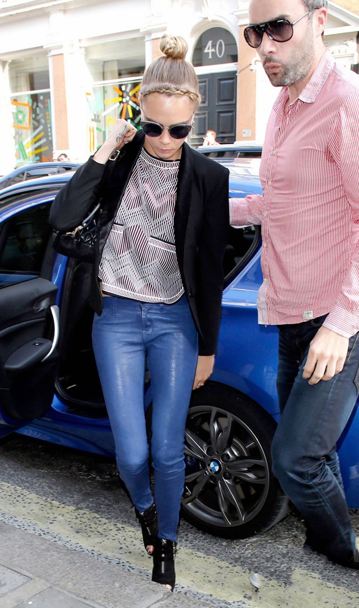 Cara Delevingne seen leaving home and heads to a London hotel
