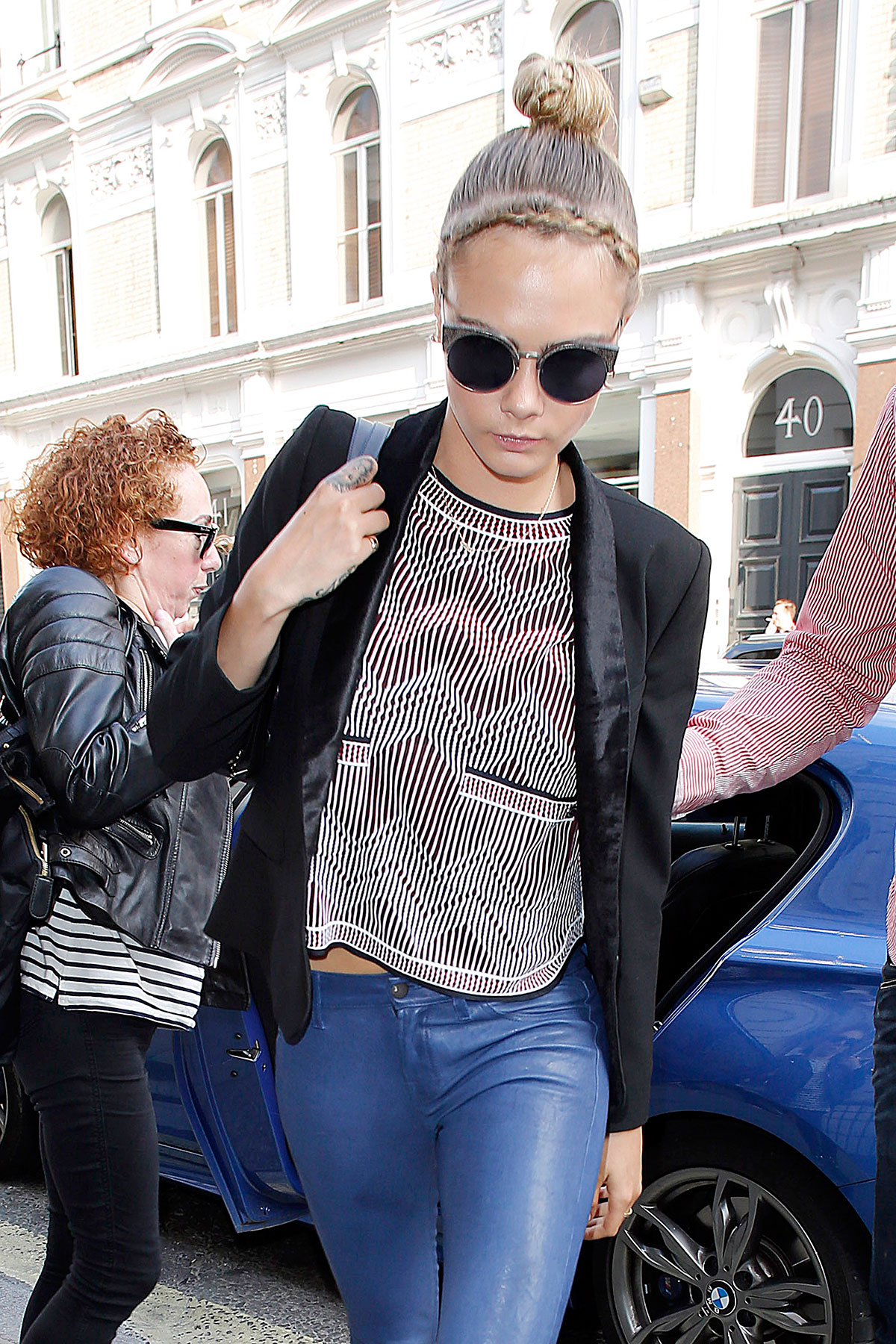 Cara Delevingne seen leaving home and heads to a London hotel