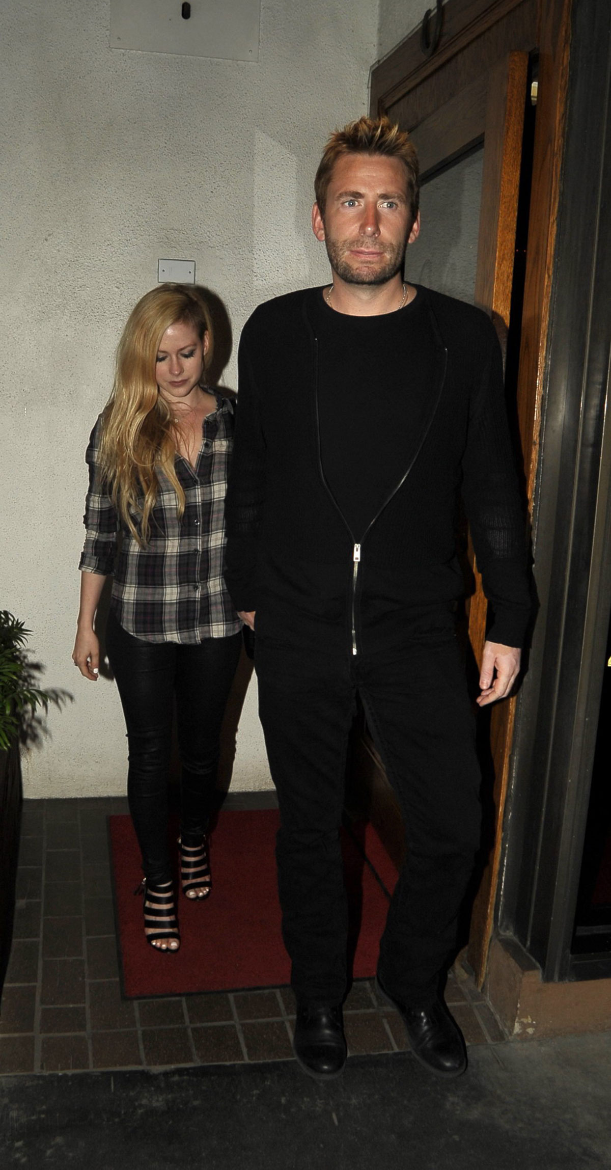 Avril Lavigne leaving Madeo Restaurant