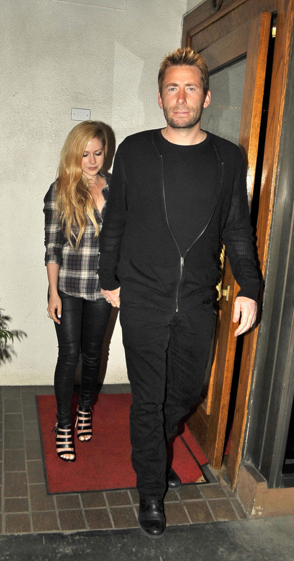 Avril Lavigne leaving Madeo Restaurant