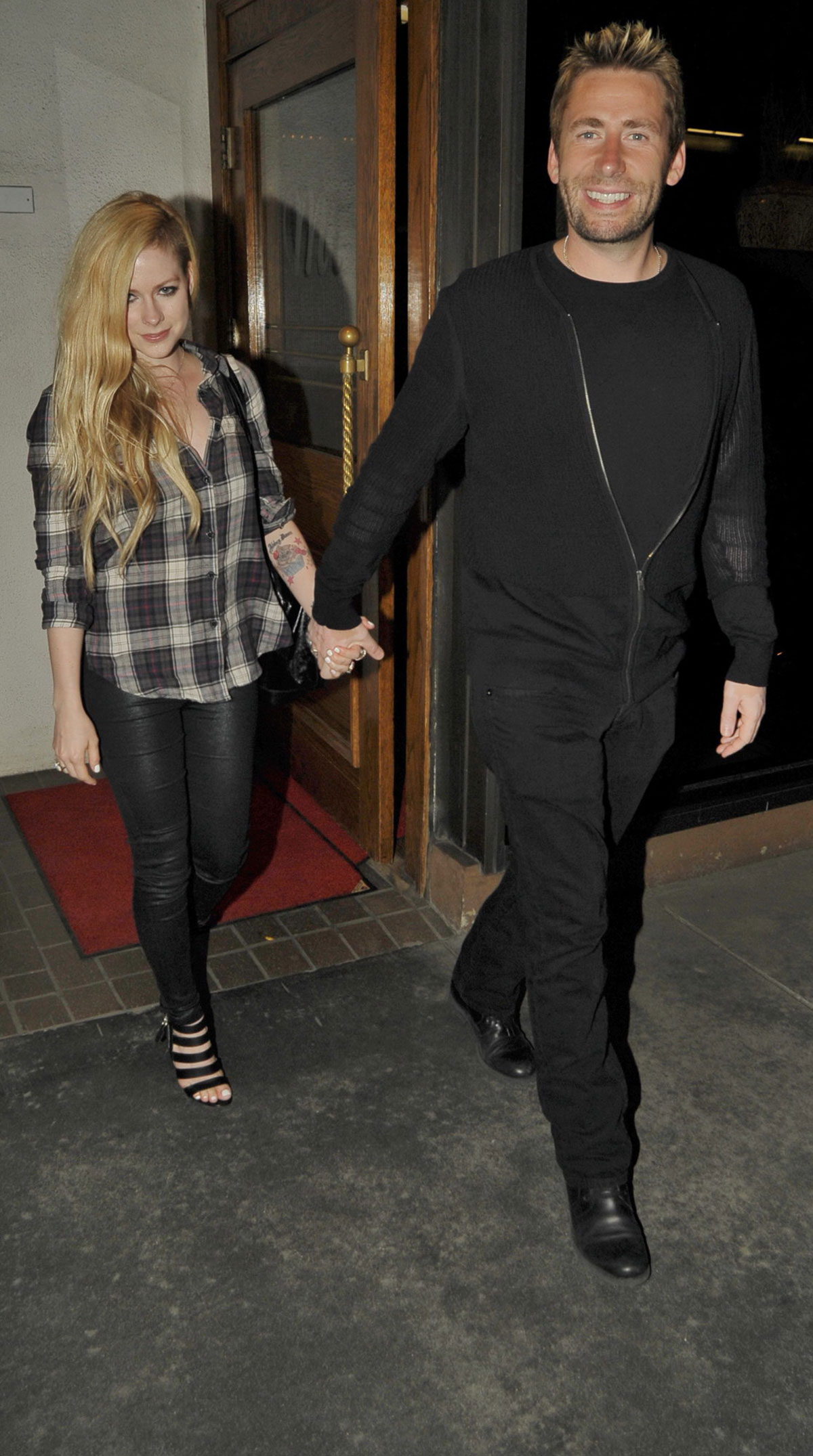 Avril Lavigne leaving Madeo Restaurant