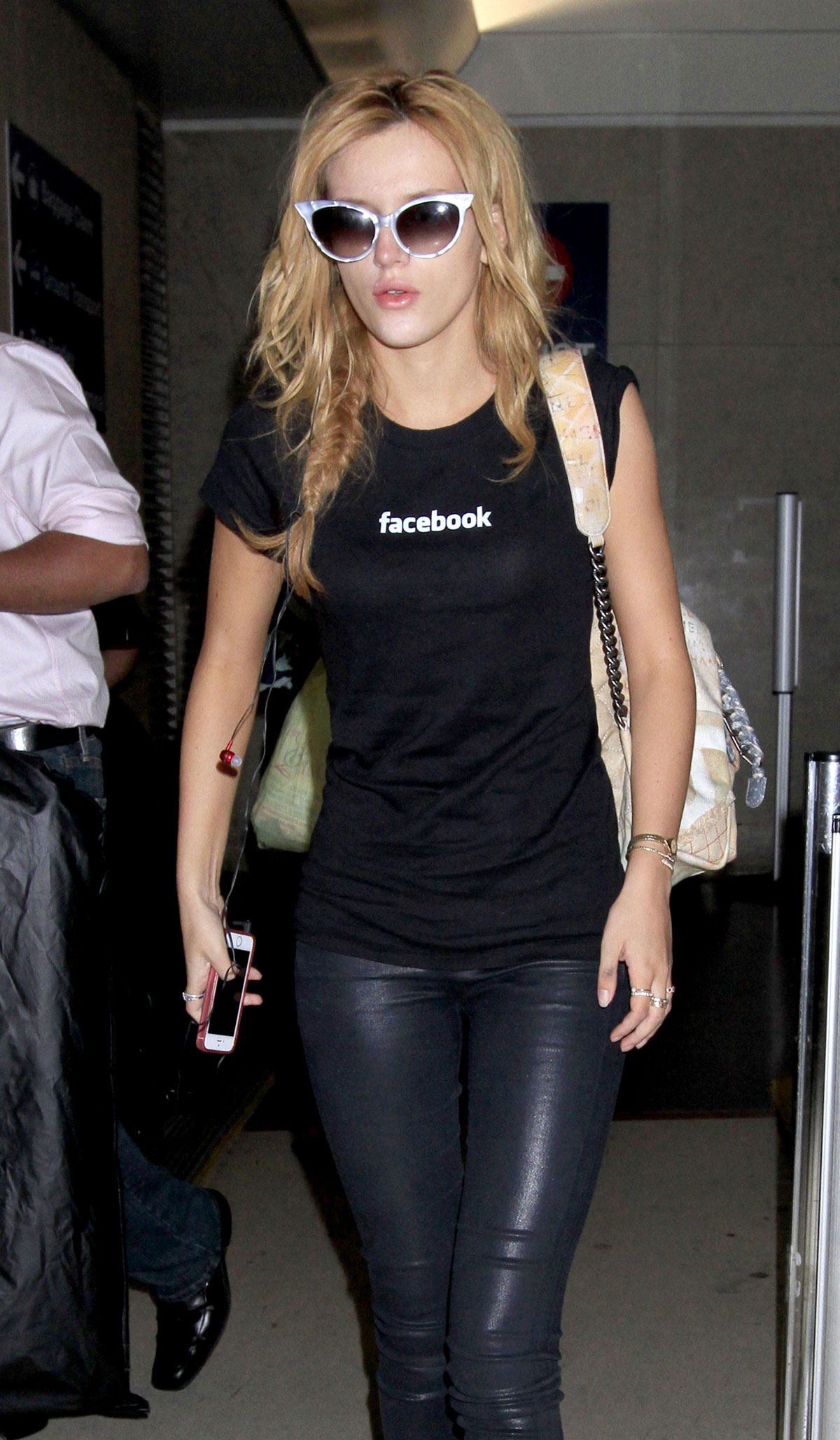 Bella Thorne making her way through LAX Airport