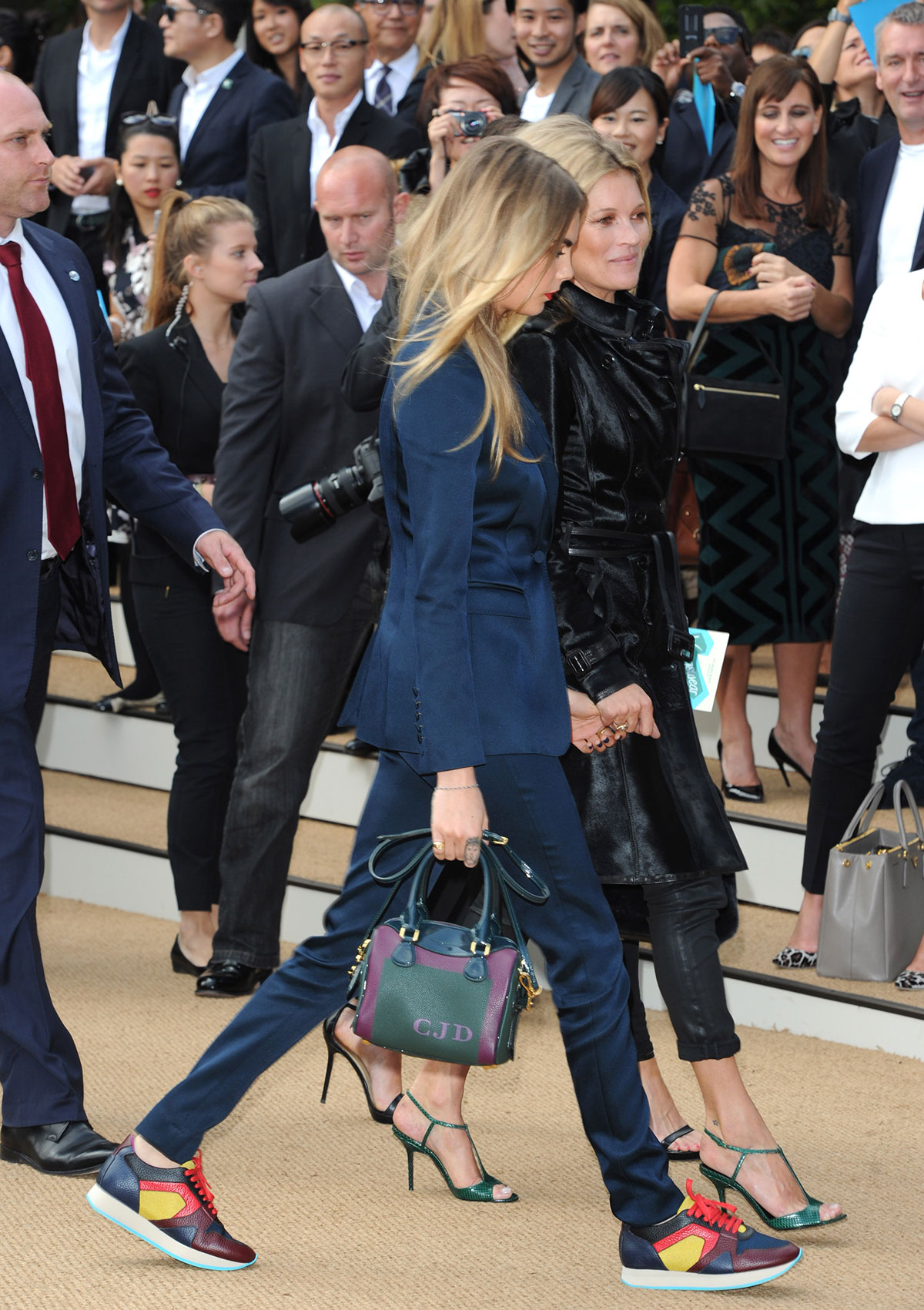 Cara Delevingne and Kate Moss attend Burberry Prorsum show