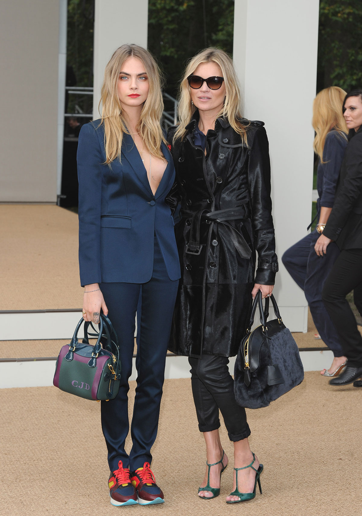 Cara Delevingne and Kate Moss attend Burberry Prorsum show