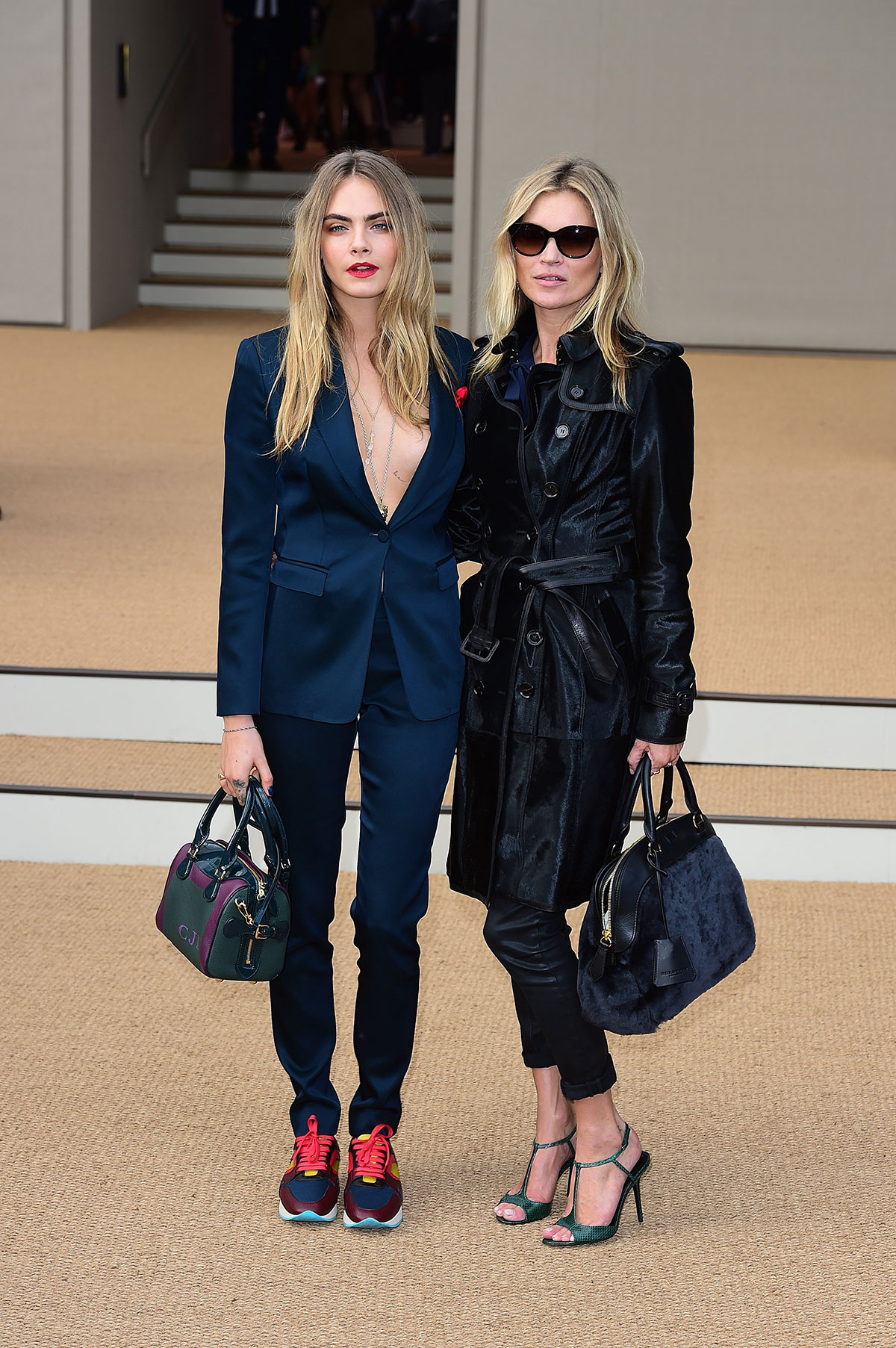 Cara Delevingne and Kate Moss attend Burberry Prorsum show