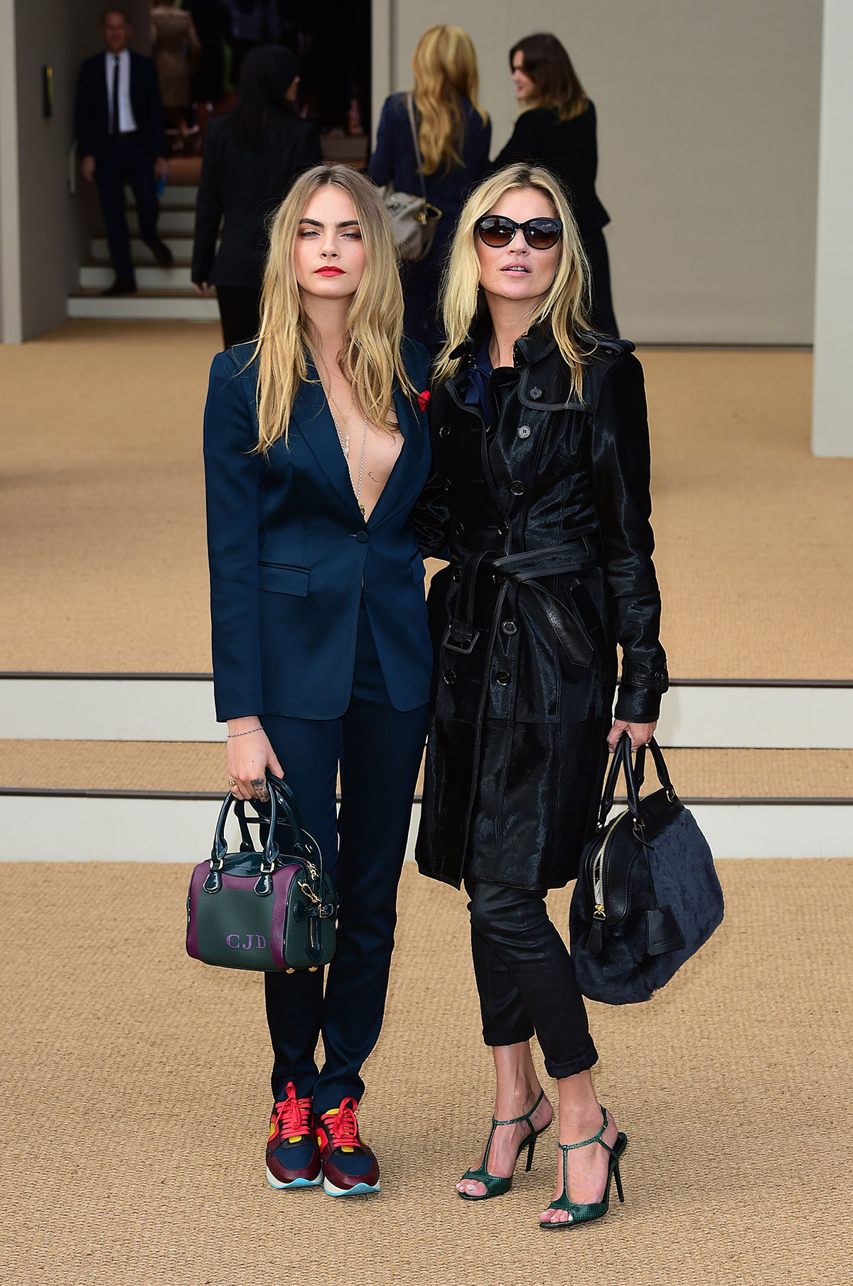 Cara Delevingne and Kate Moss attend Burberry Prorsum show