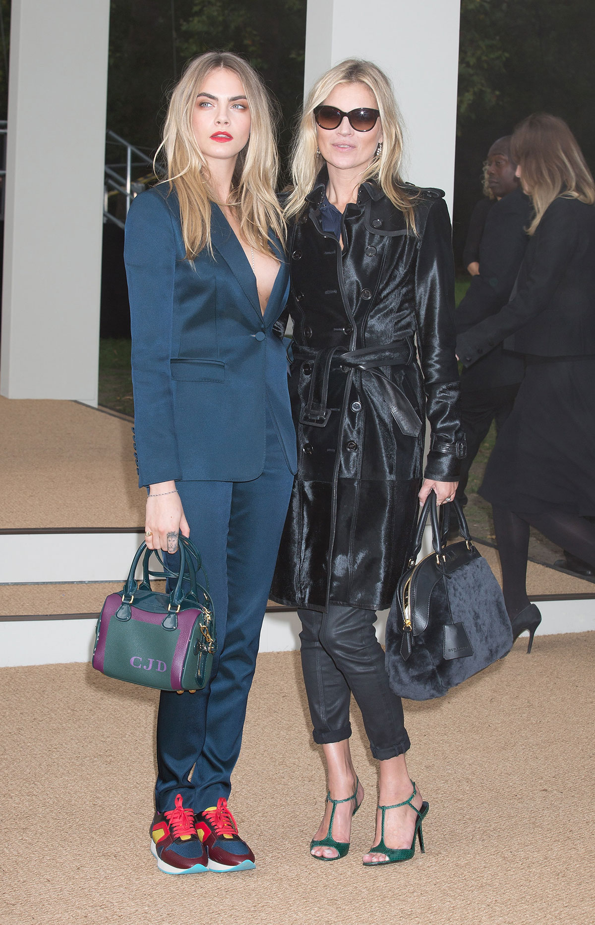 Cara Delevingne and Kate Moss attend Burberry Prorsum show