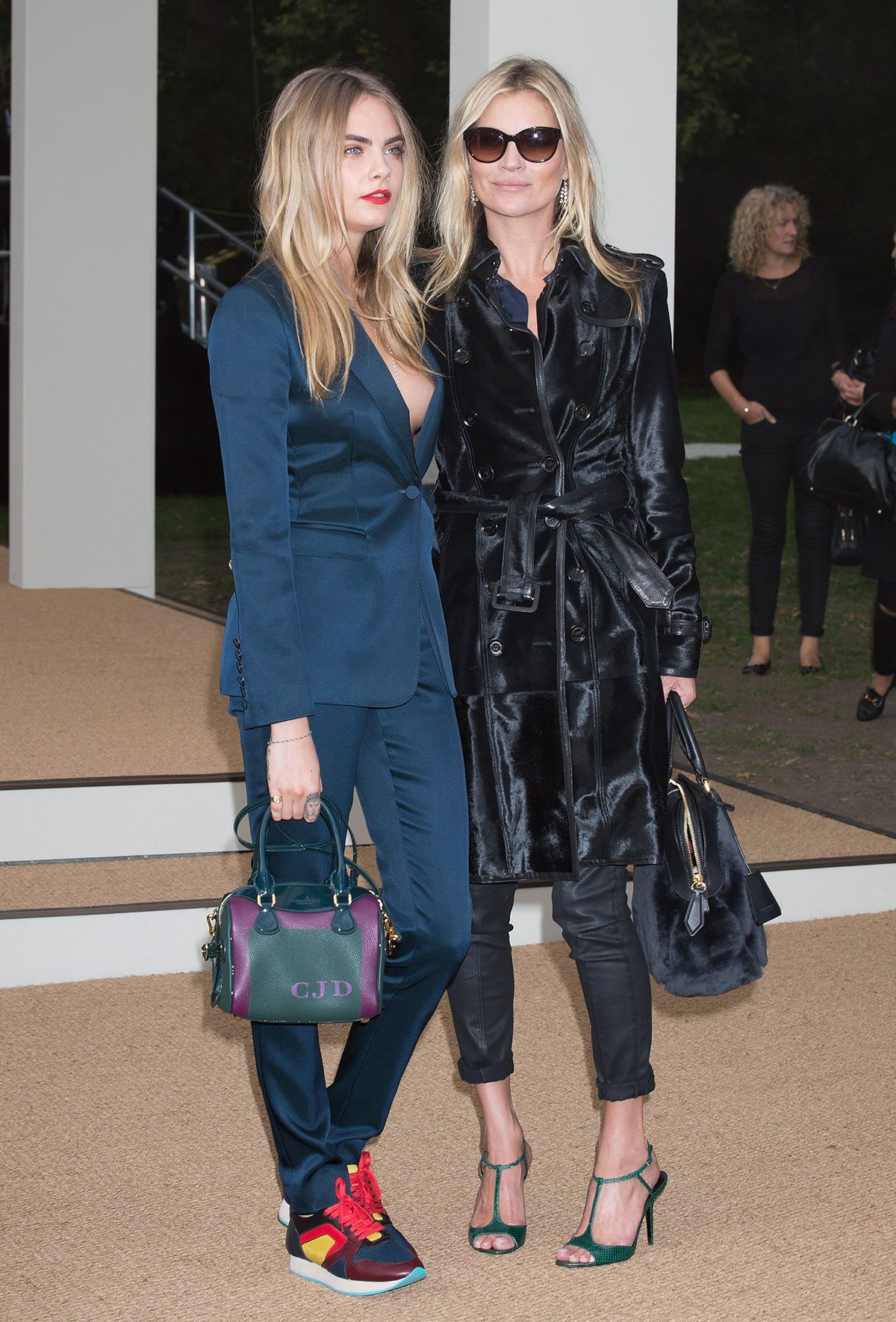 Cara Delevingne and Kate Moss attend Burberry Prorsum show