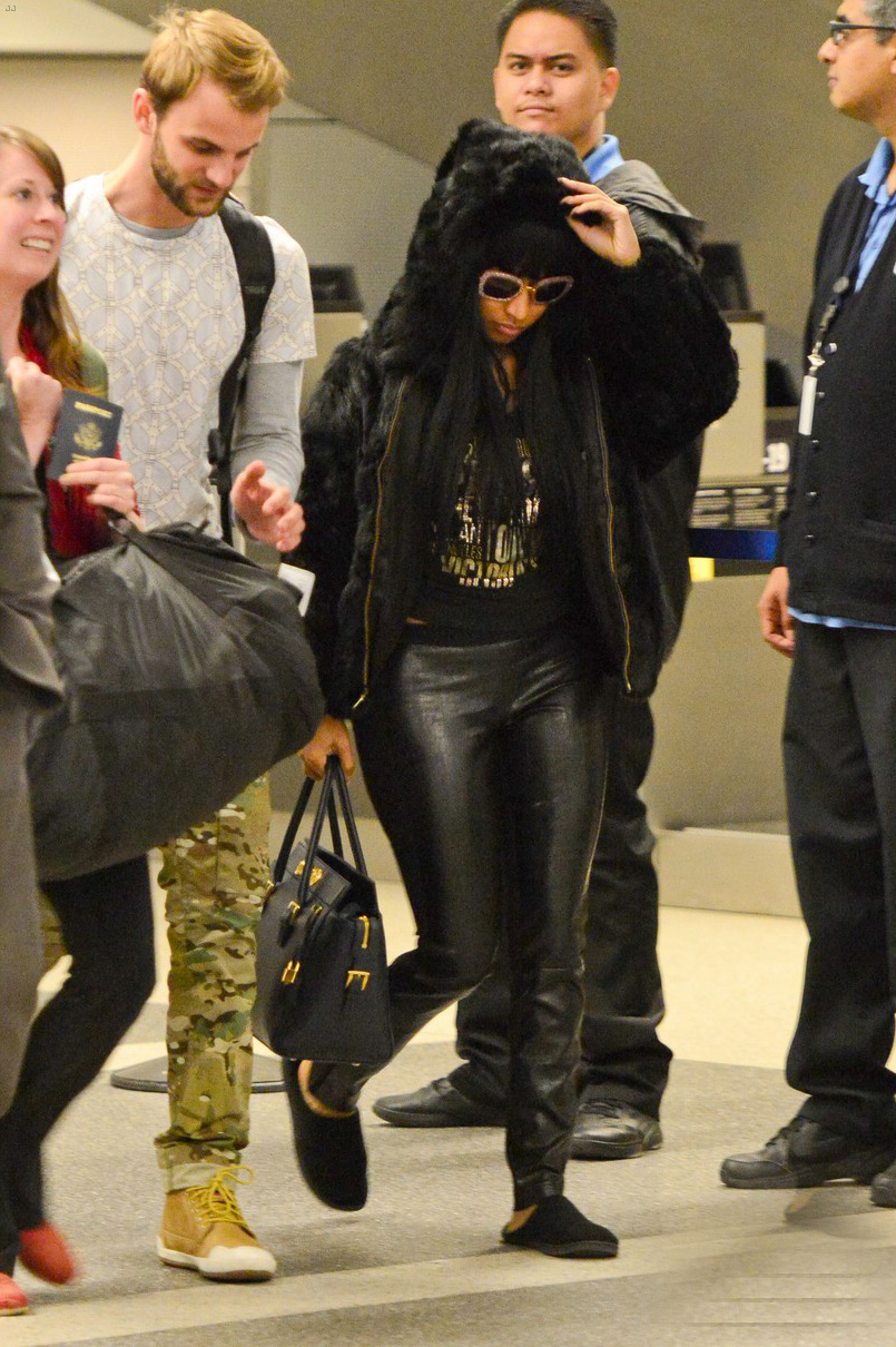 Nicki Minaj arriving on an international flight at LAX Airport