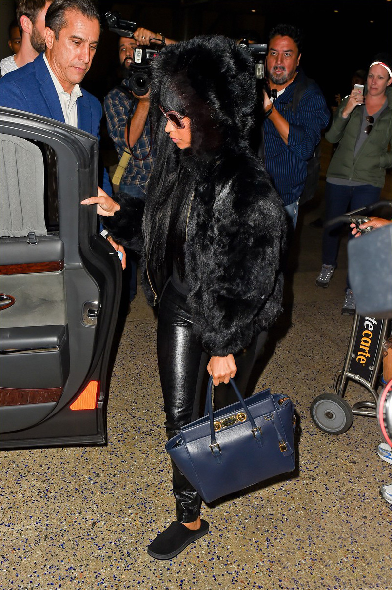 Nicki Minaj arriving on an international flight at LAX Airport