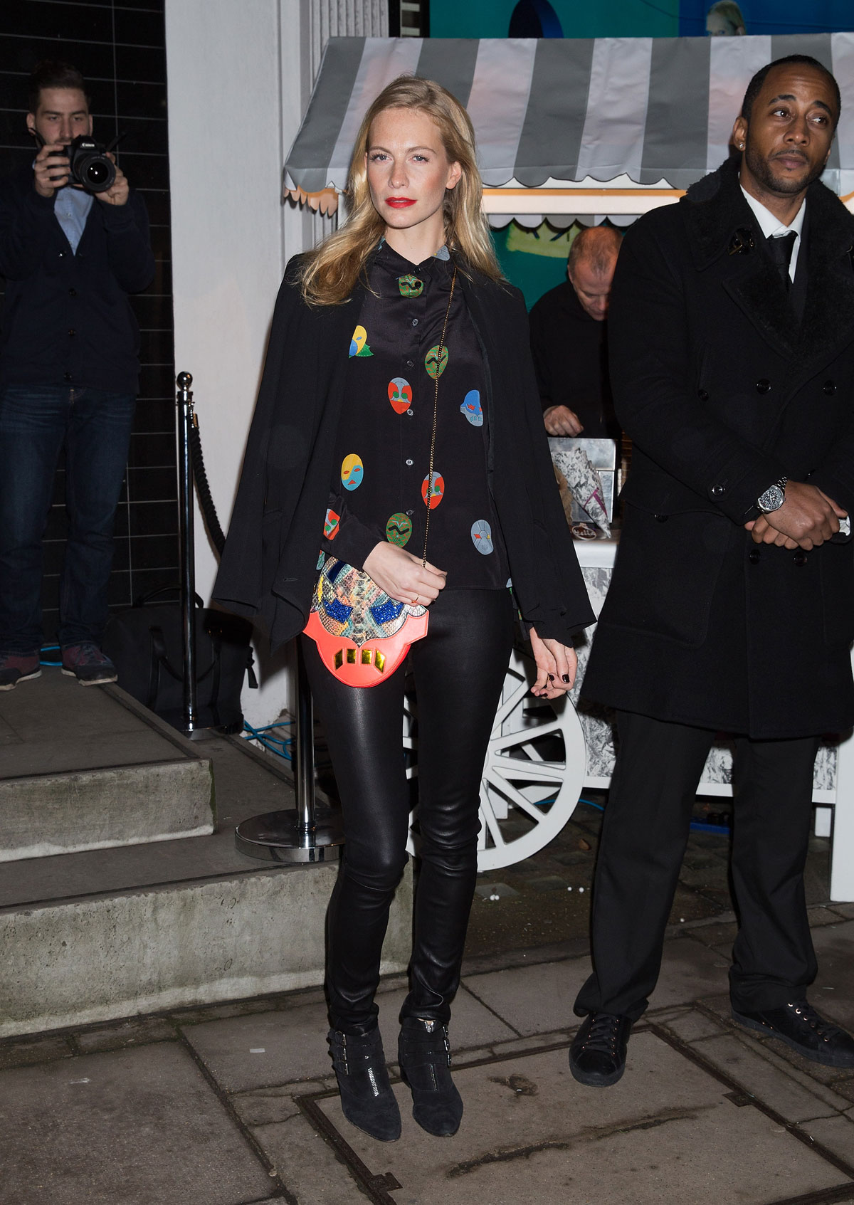 Poppy Delevingne attends the Stella McCartney Christmas Lights Switch On