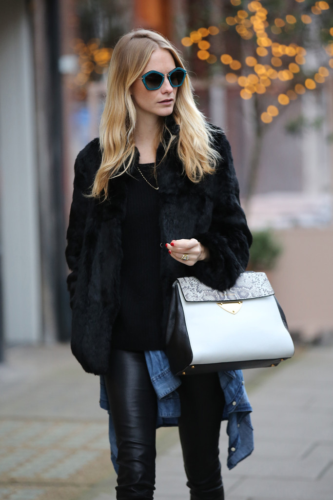 Poppy Delevingne wears the new Coccinelle B14 Bag