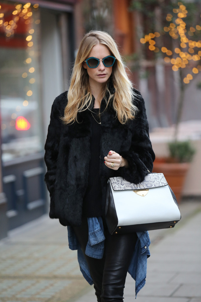 Poppy Delevingne wears the new Coccinelle B14 Bag