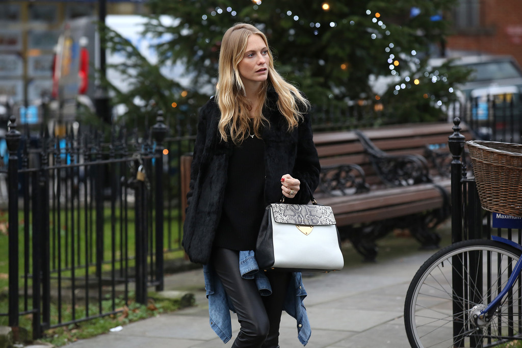 Poppy Delevingne wears the new Coccinelle B14 Bag