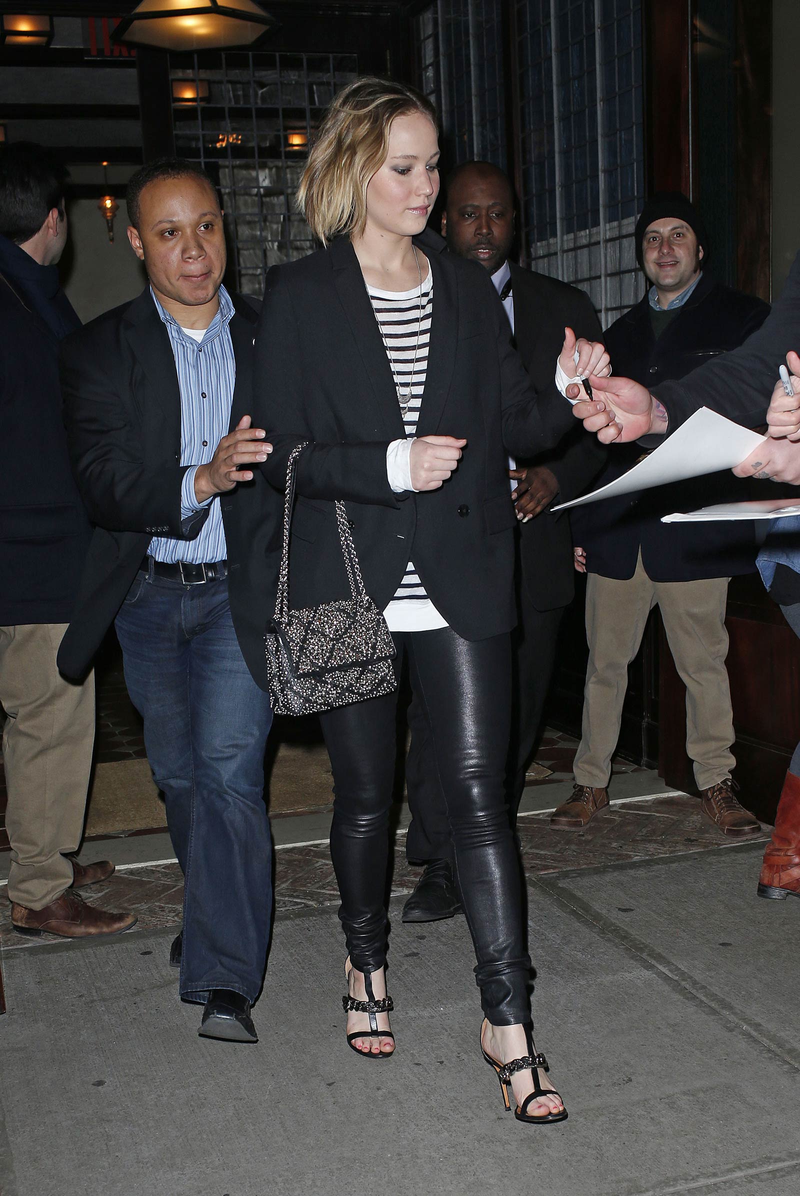 Jennifer Lawrence walking outside of the Greenwich Hotel