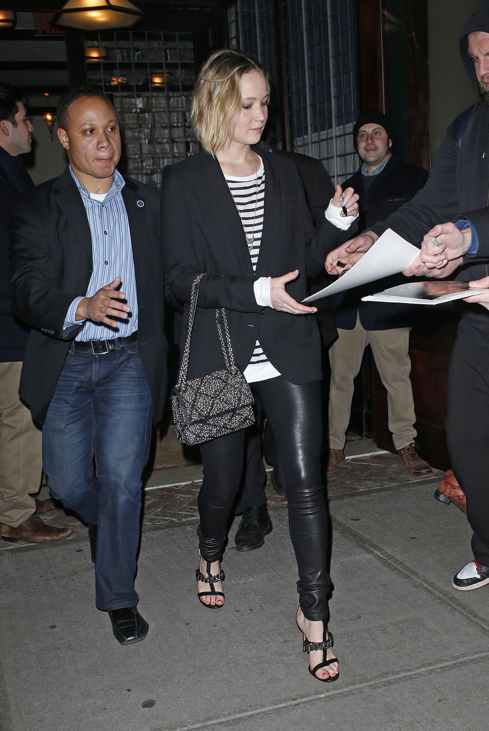 Jennifer Lawrence walking outside of the Greenwich Hotel