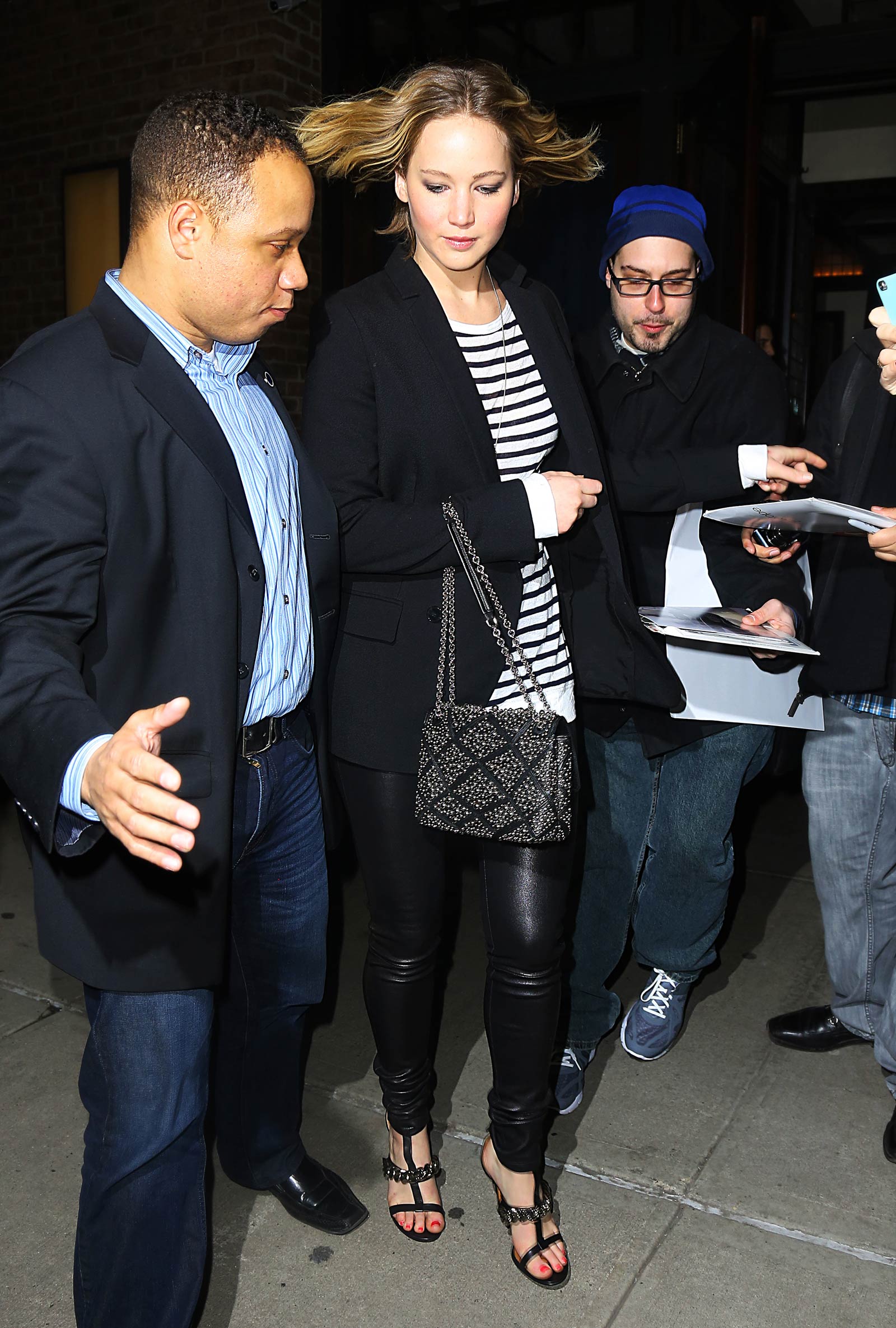 Jennifer Lawrence walking outside of the Greenwich Hotel