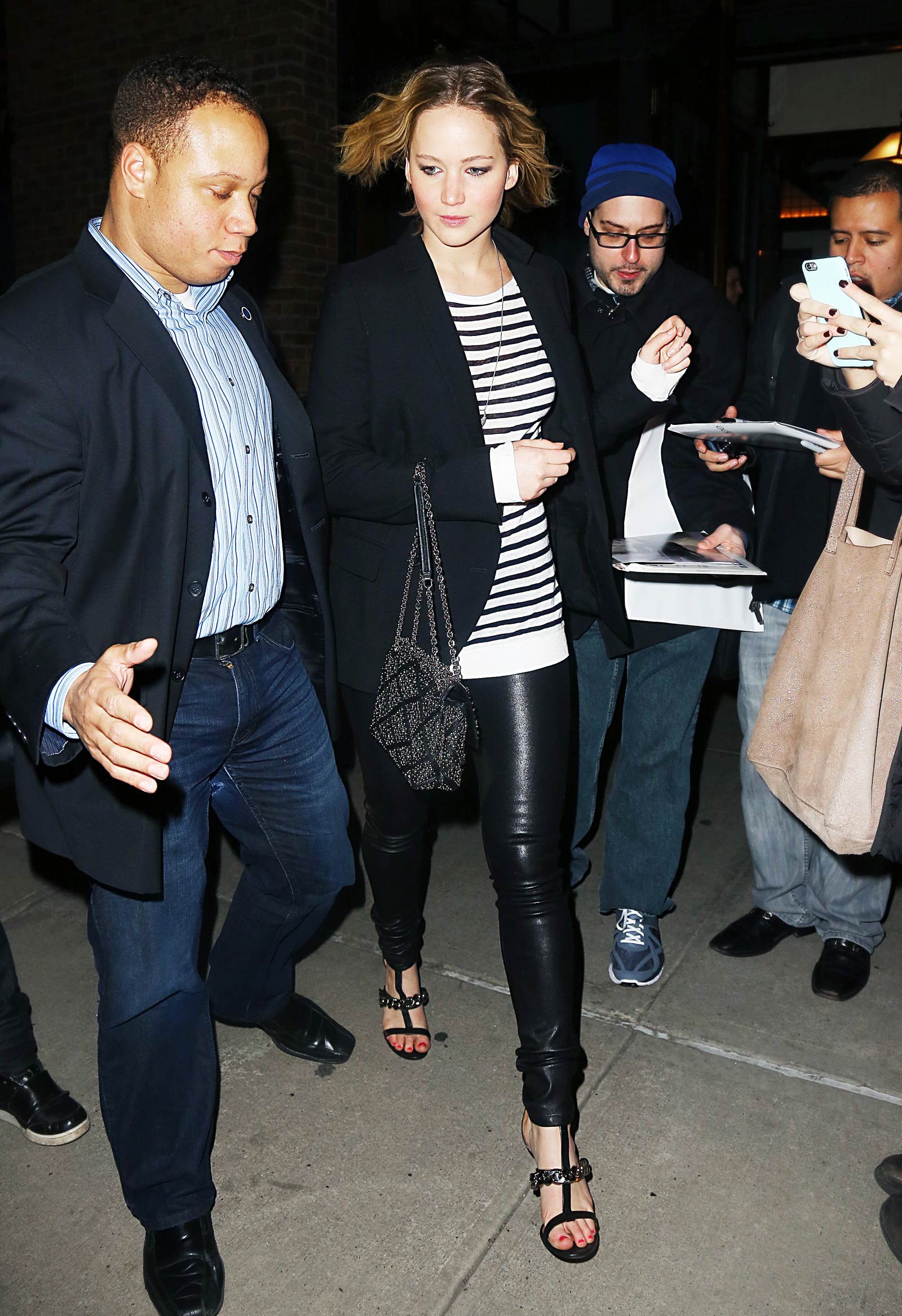 Jennifer Lawrence walking outside of the Greenwich Hotel