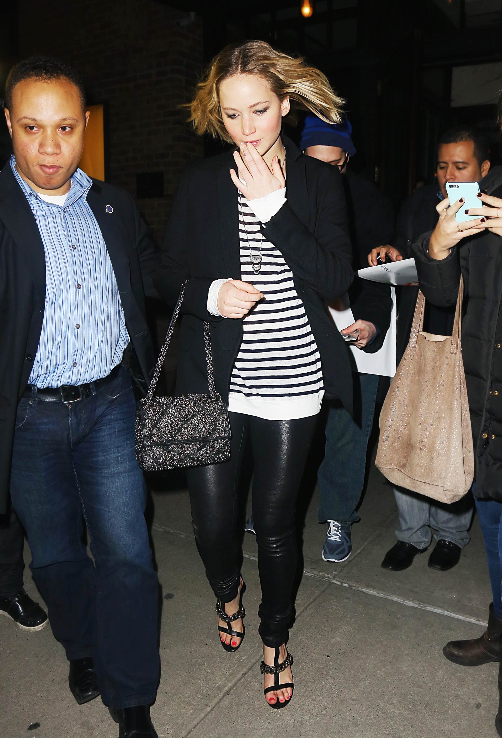 Jennifer Lawrence walking outside of the Greenwich Hotel