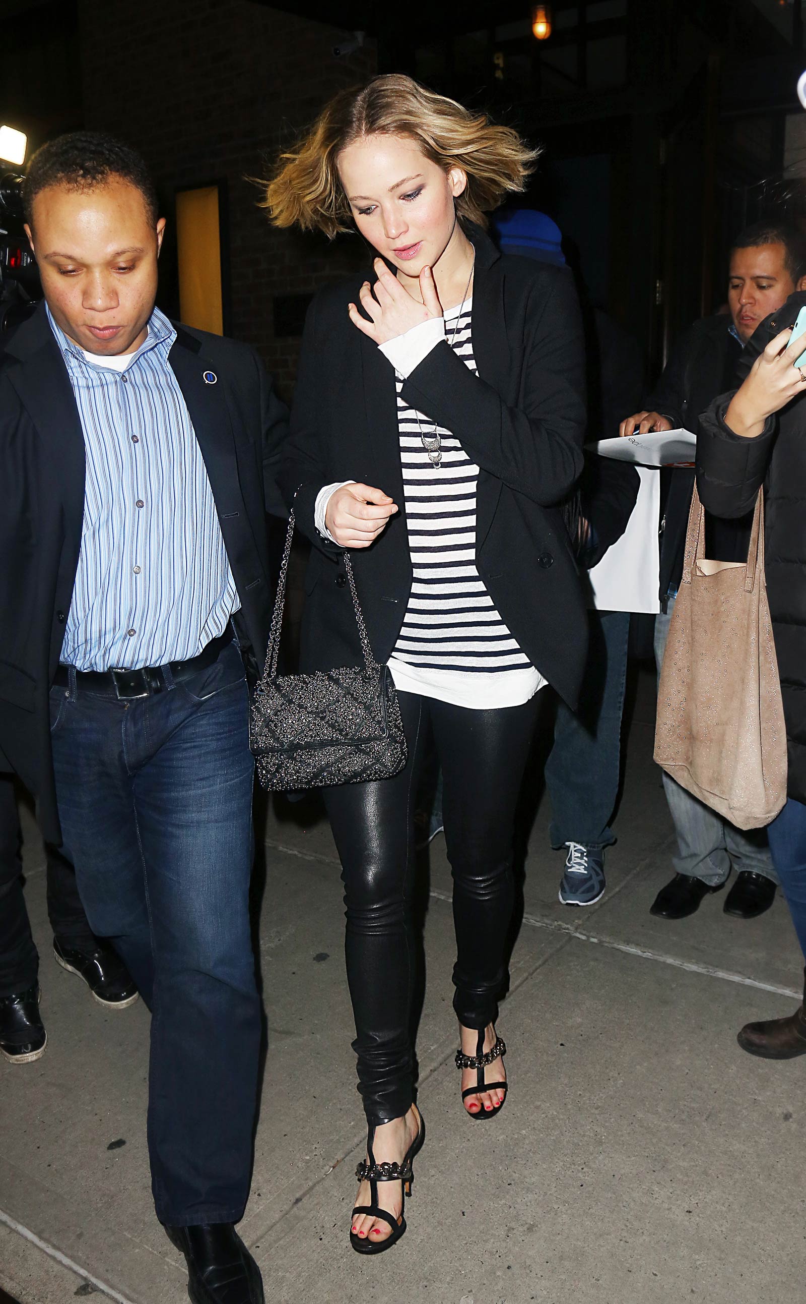 Jennifer Lawrence walking outside of the Greenwich Hotel