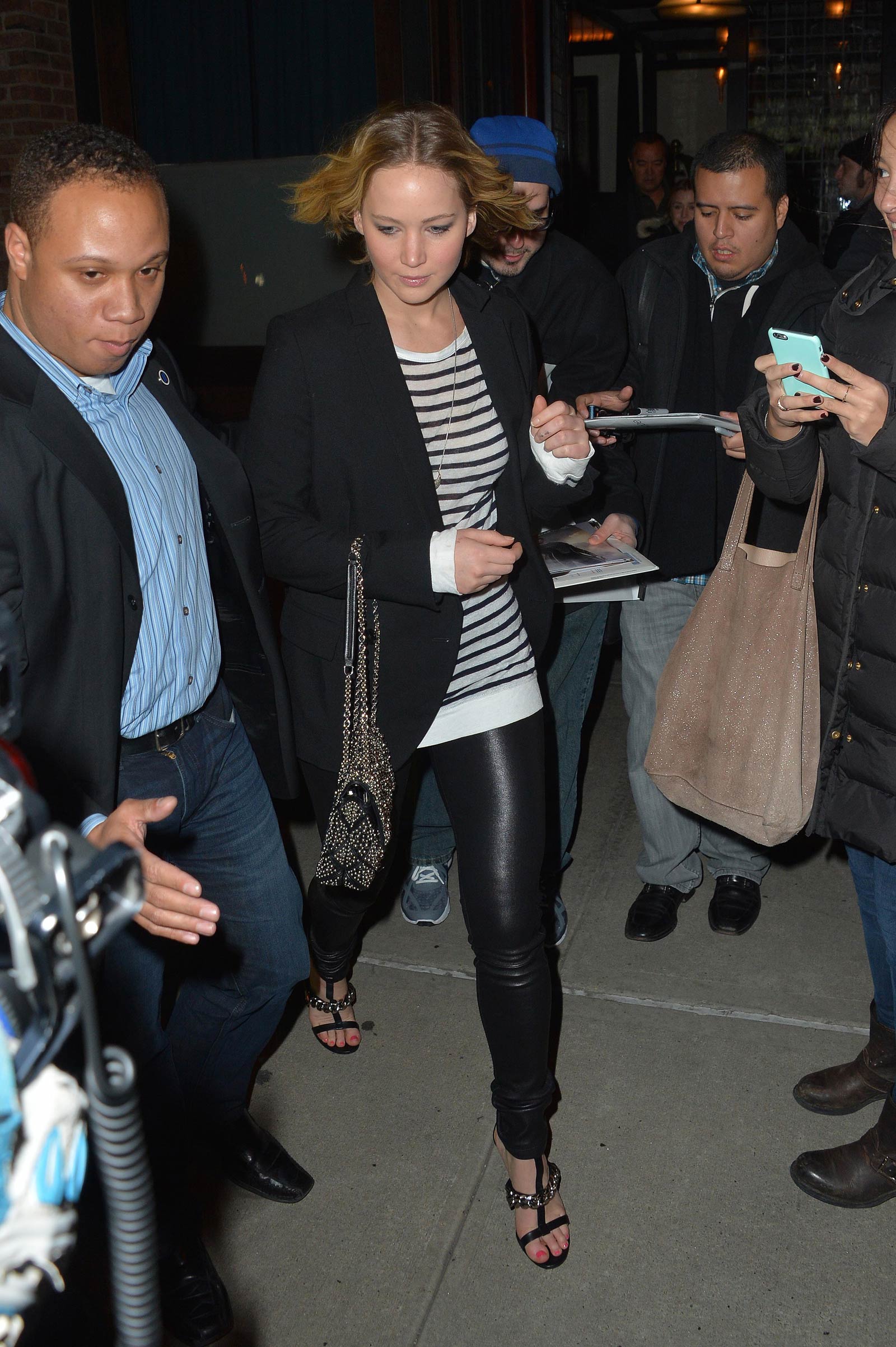 Jennifer Lawrence walking outside of the Greenwich Hotel