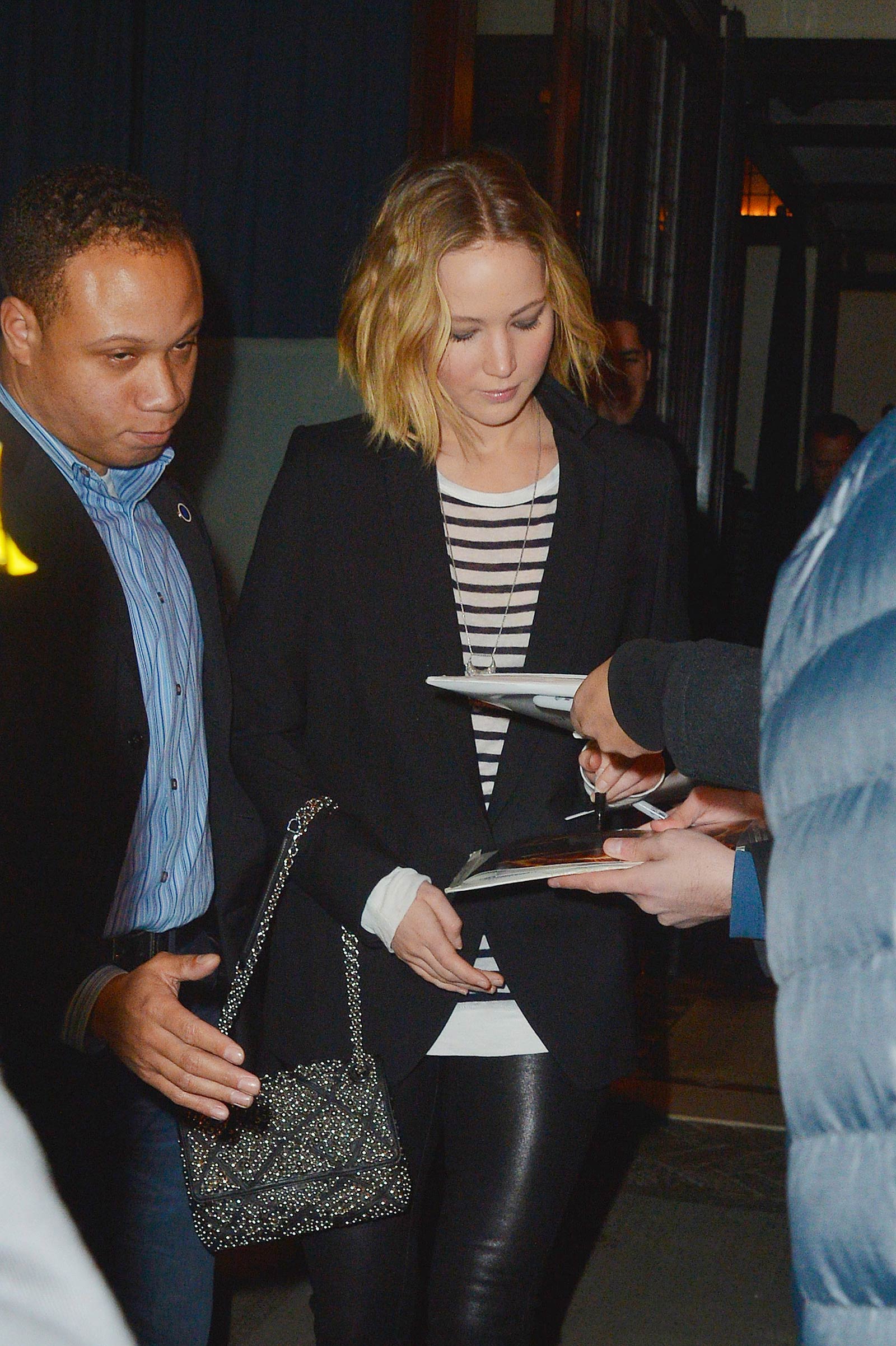 Jennifer Lawrence walking outside of the Greenwich Hotel