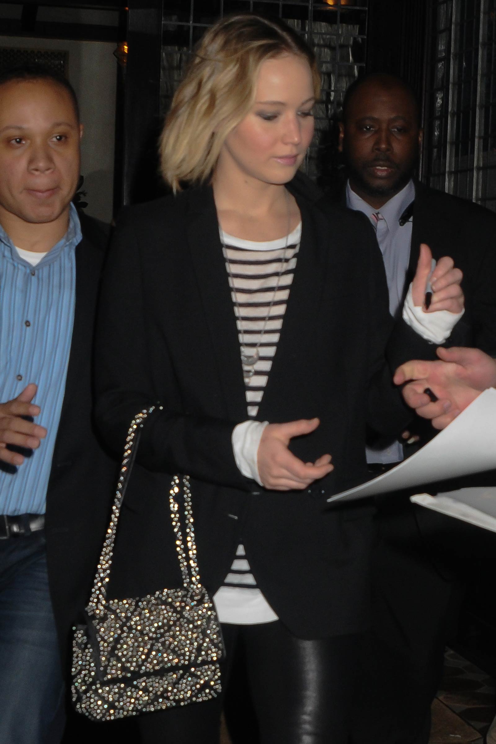 Jennifer Lawrence walking outside of the Greenwich Hotel