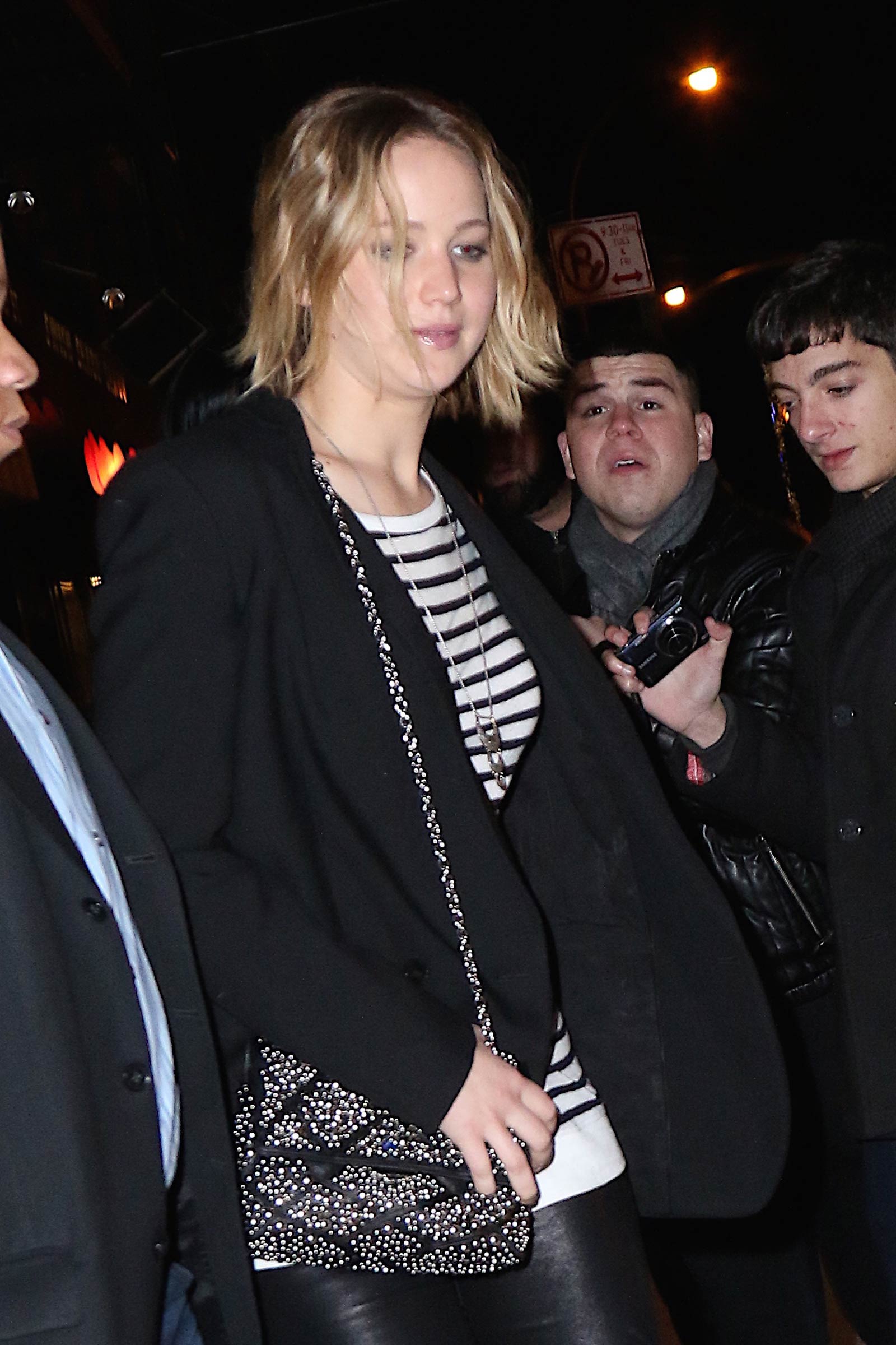 Jennifer Lawrence walking outside of the Greenwich Hotel